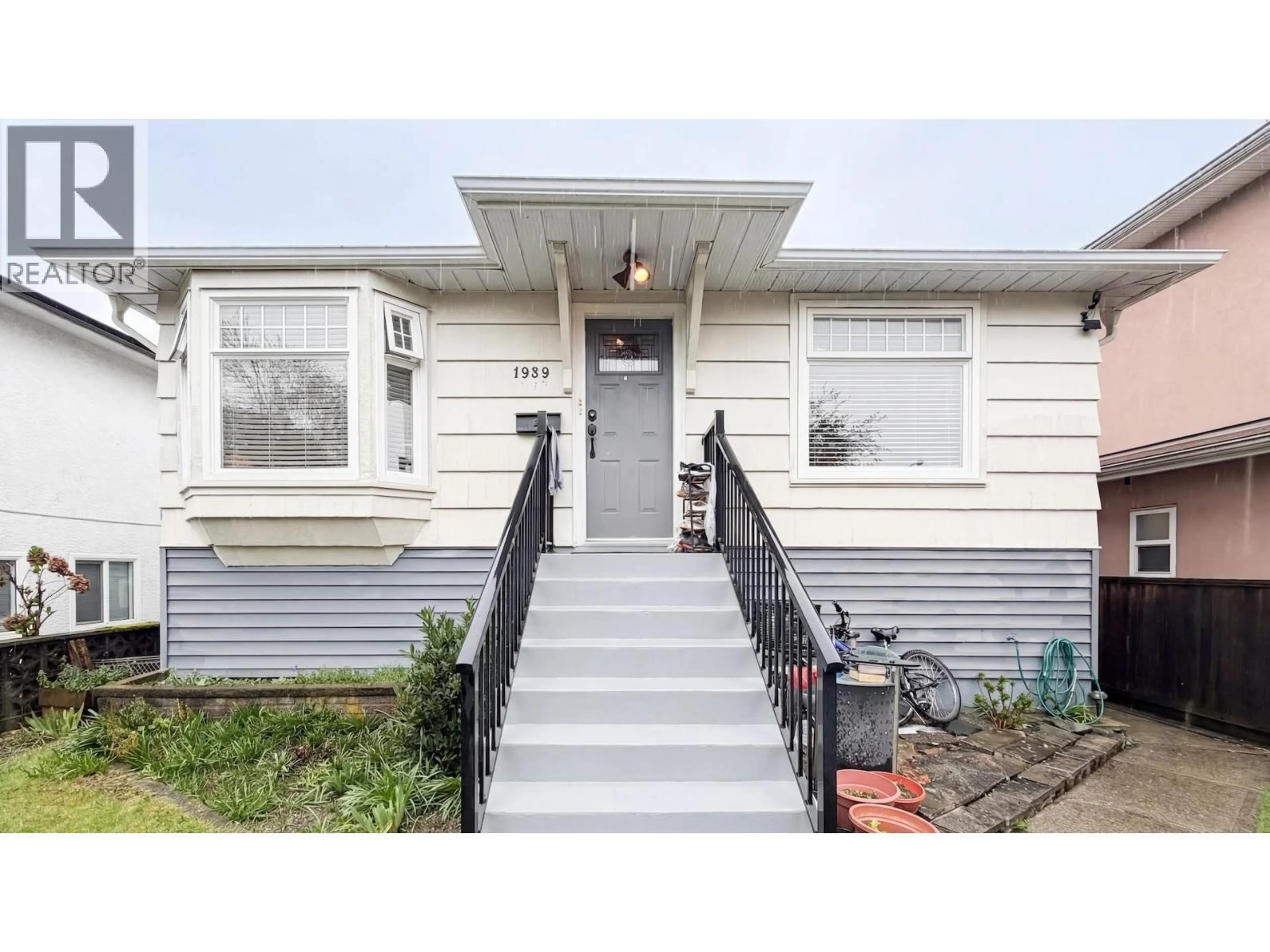 Home with vinyl exterior material, street for 1939 39TH AVENUE, Vancouver British Columbia V5P1H5