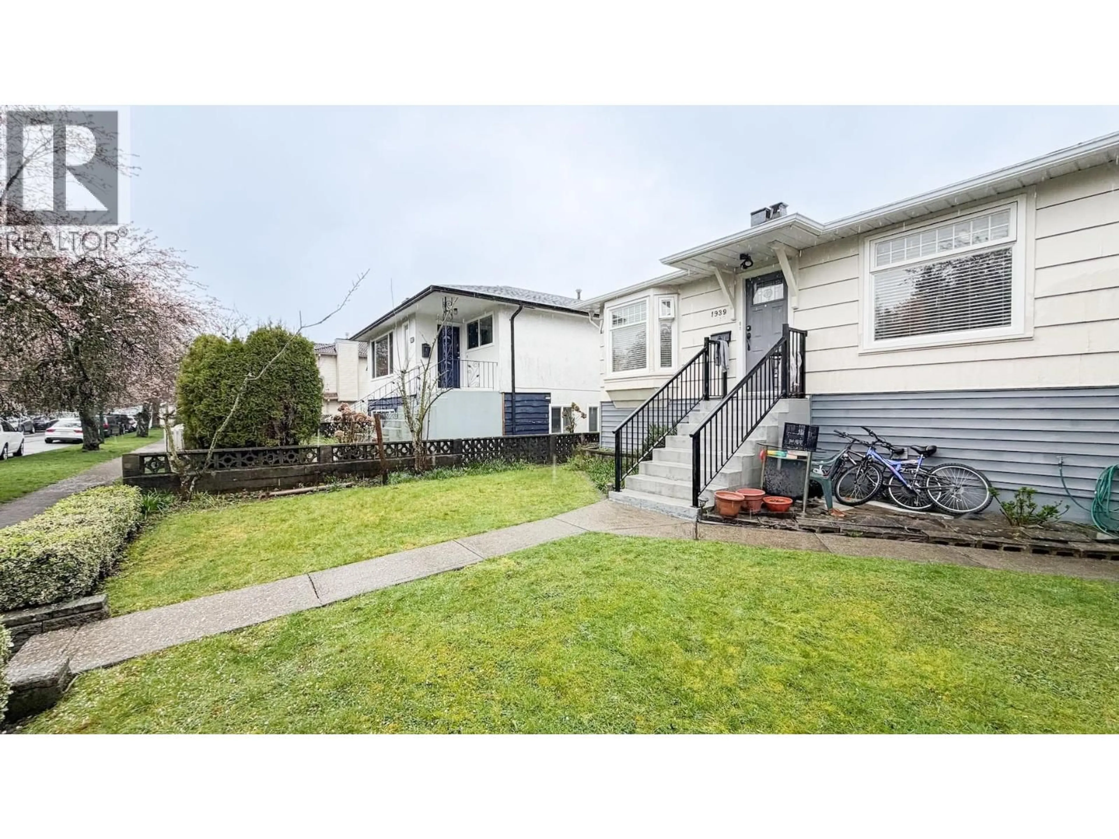 Home with vinyl exterior material, street for 1939 39TH AVENUE, Vancouver British Columbia V5P1H5