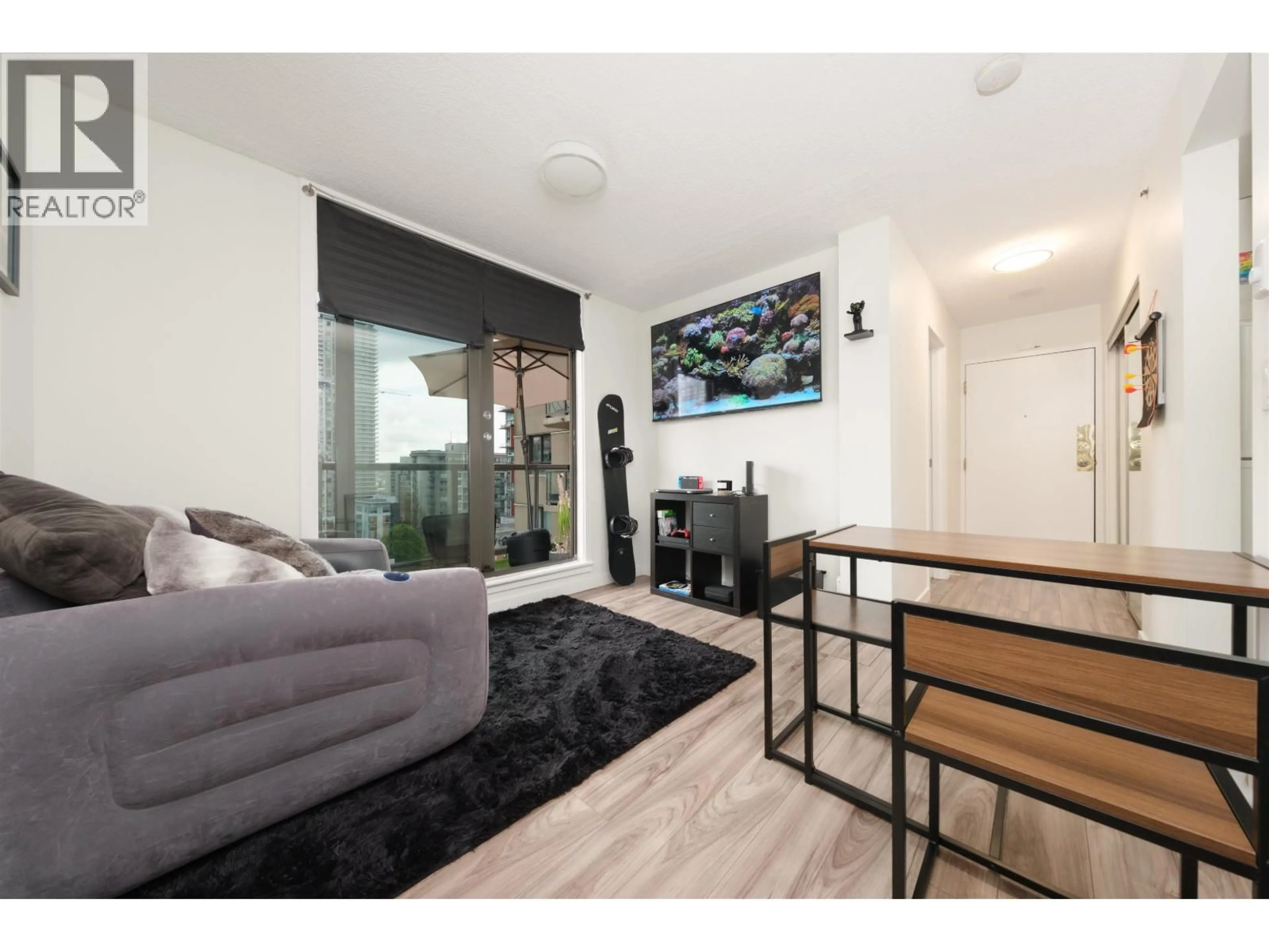 Living room with furniture, wood/laminate floor for 801 - 789 DRAKE STREET, Vancouver British Columbia V6Z2N7