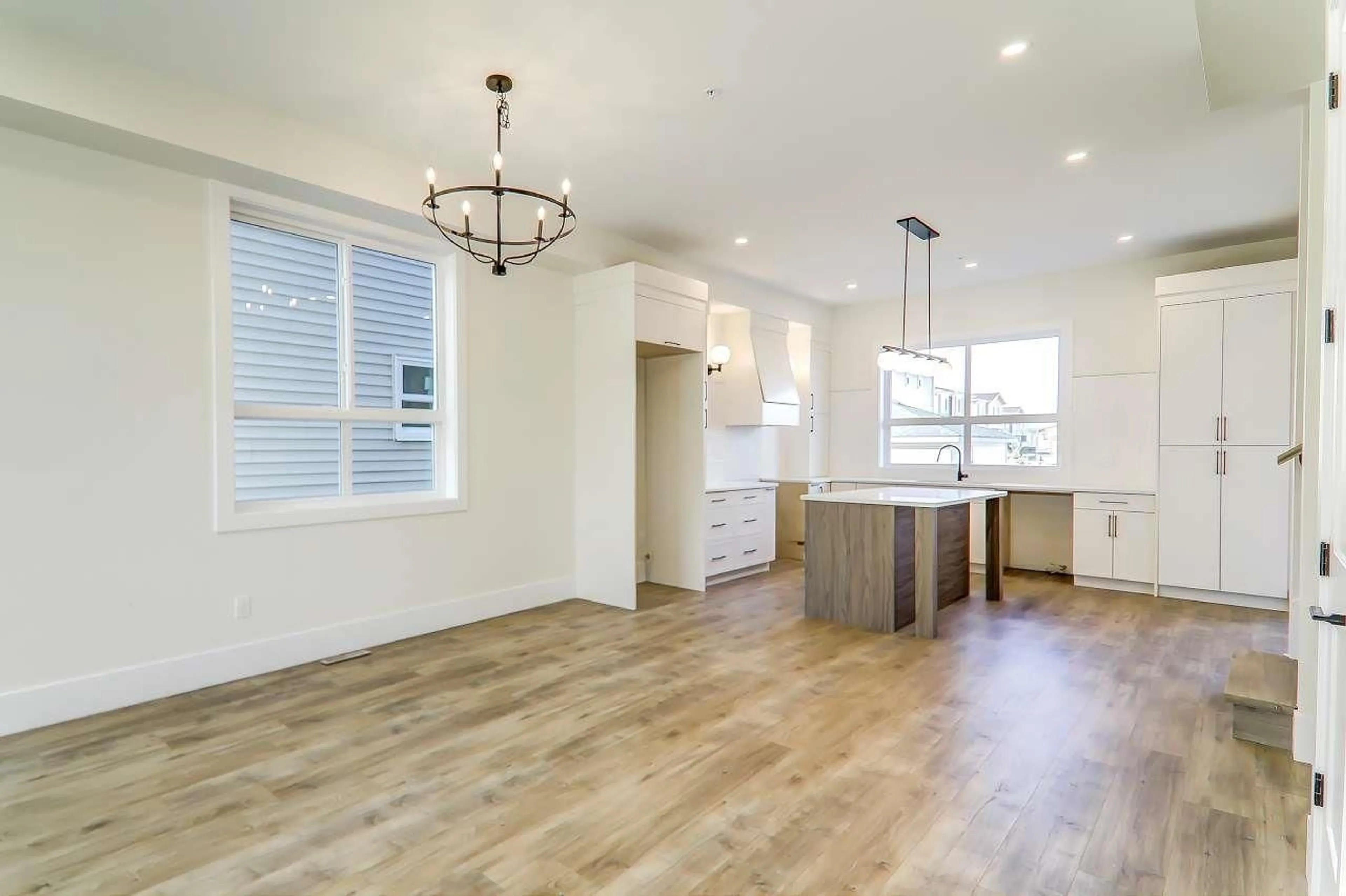 Open concept kitchen, wood/laminate floor for 20687 76 AVENUE, Langley British Columbia V3V1V5