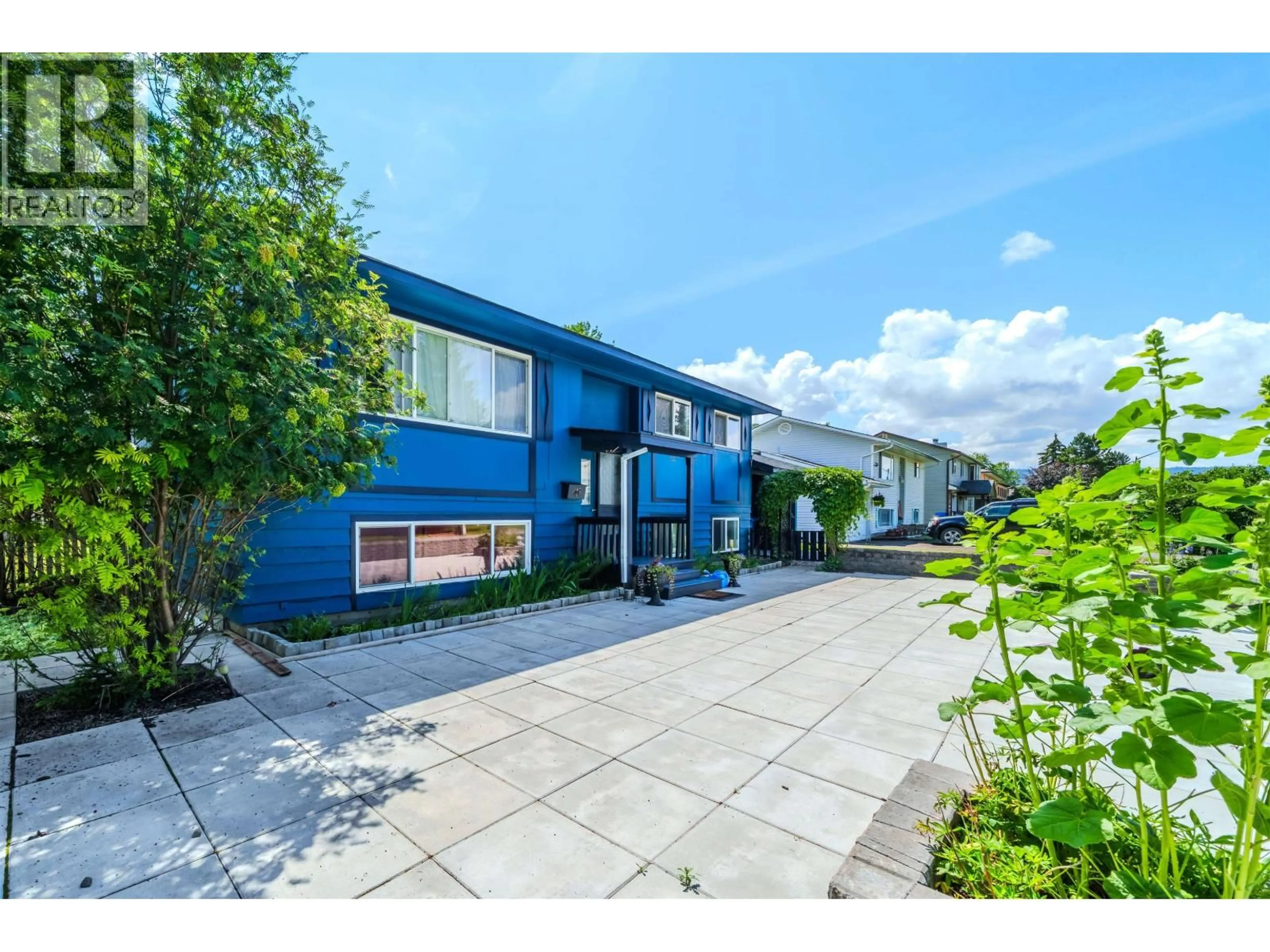 A pic from outside/outdoor area/front of a property/back of a property/a pic from drone, street for 287 ELM AVENUE, 100 Mile House British Columbia V0K2E0