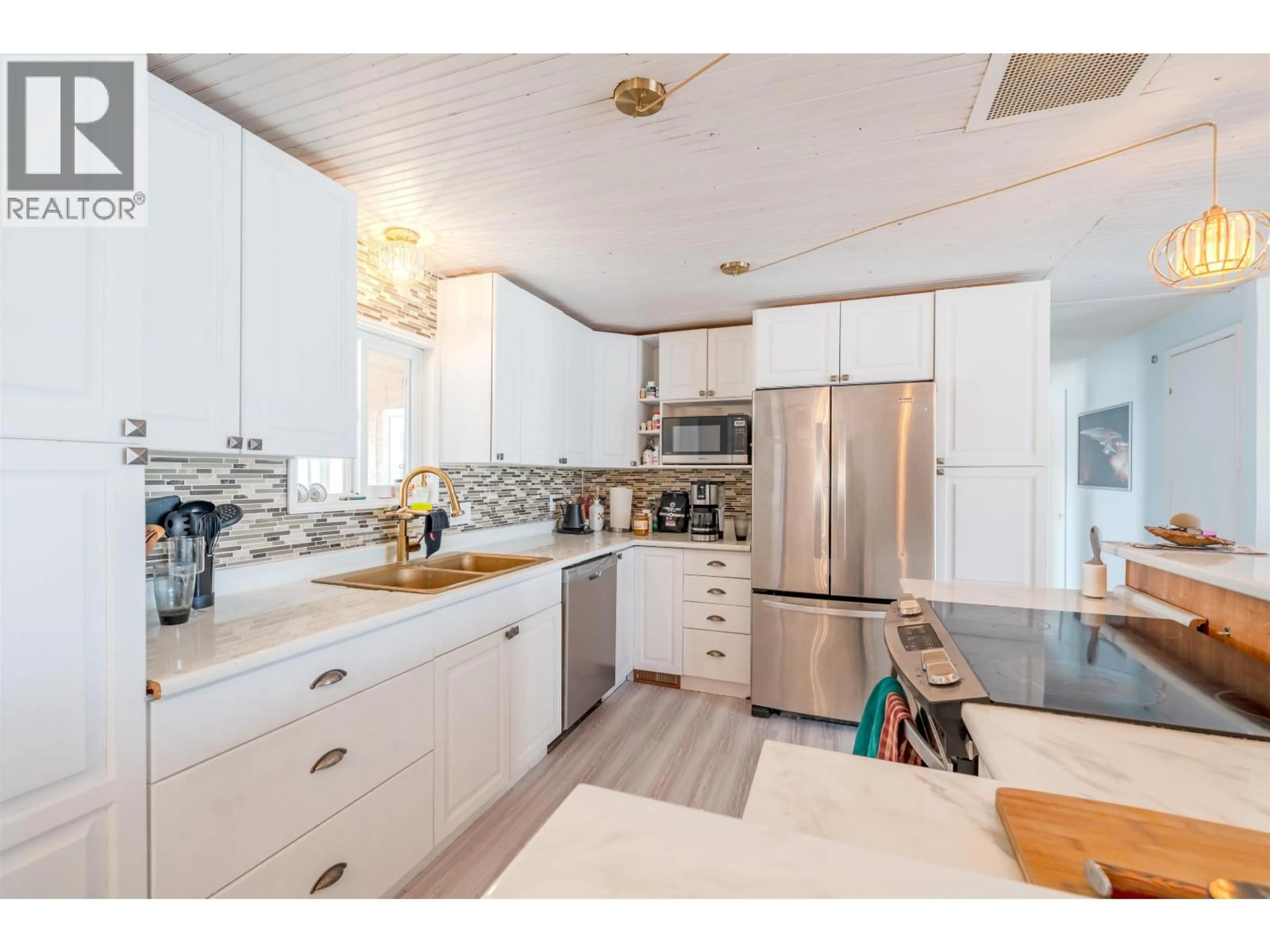 Open concept kitchen, unknown for 287 ELM AVENUE, 100 Mile House British Columbia V0K2E0