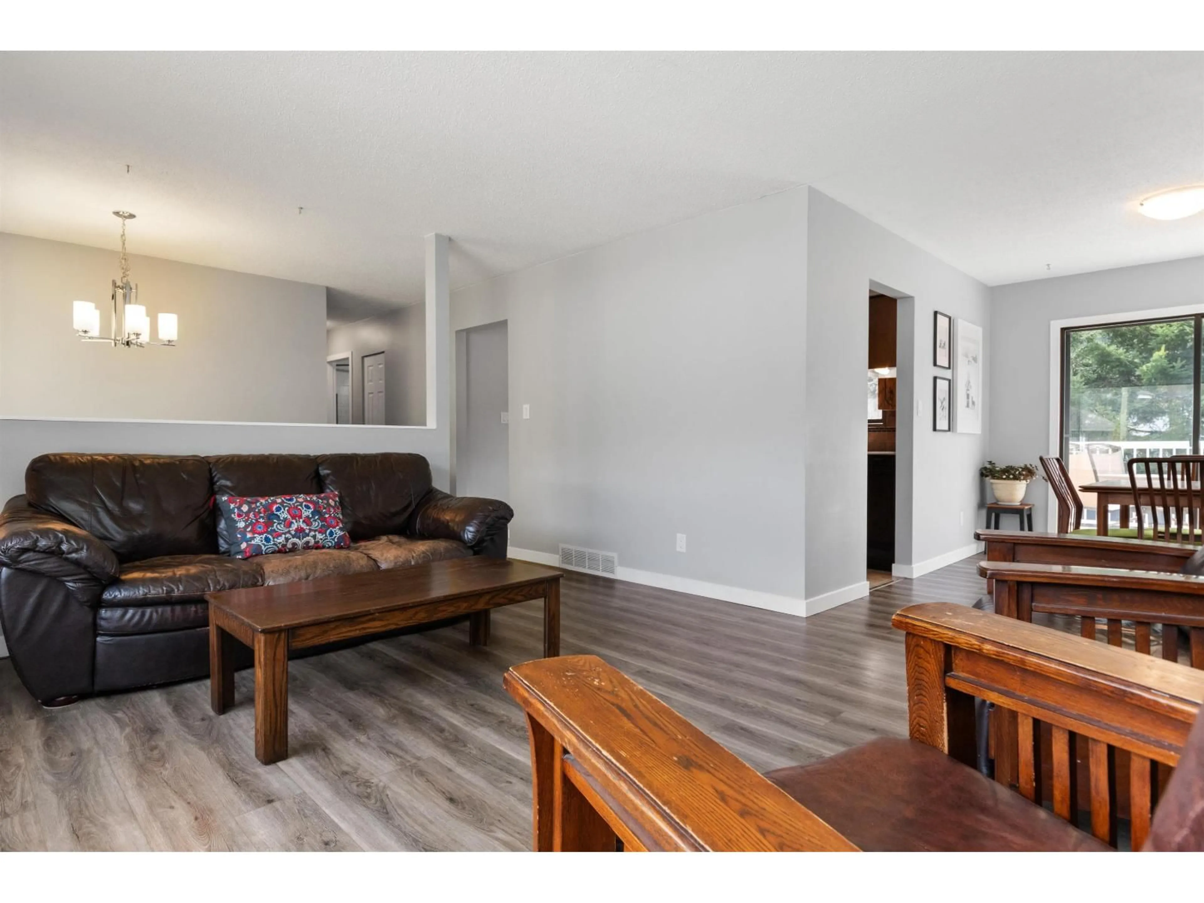 Living room with furniture, wood/laminate floor for 65560 GORDON DRIVE, Hope British Columbia V0X1L1