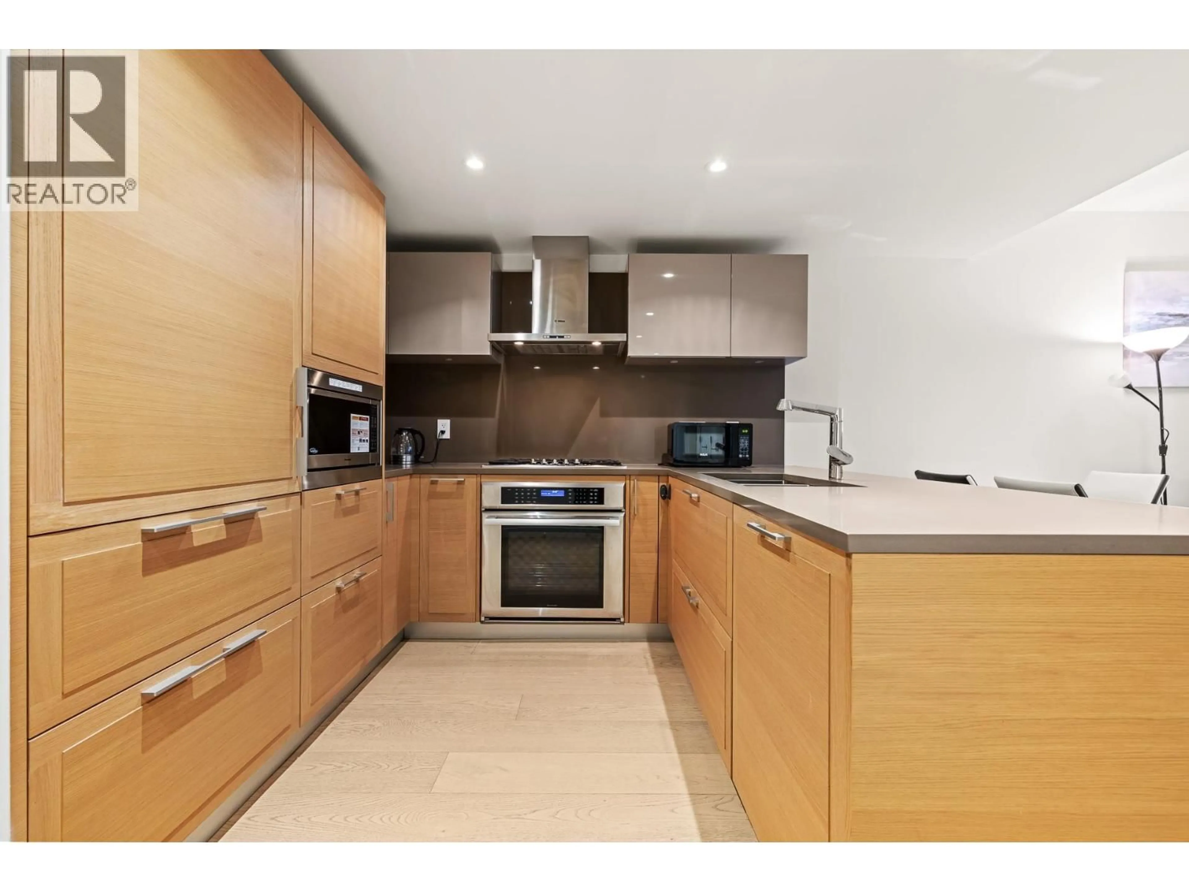 Standard kitchen, wood/laminate floor for 212 - 7128 ADERA STREET, Vancouver British Columbia V6P0H6