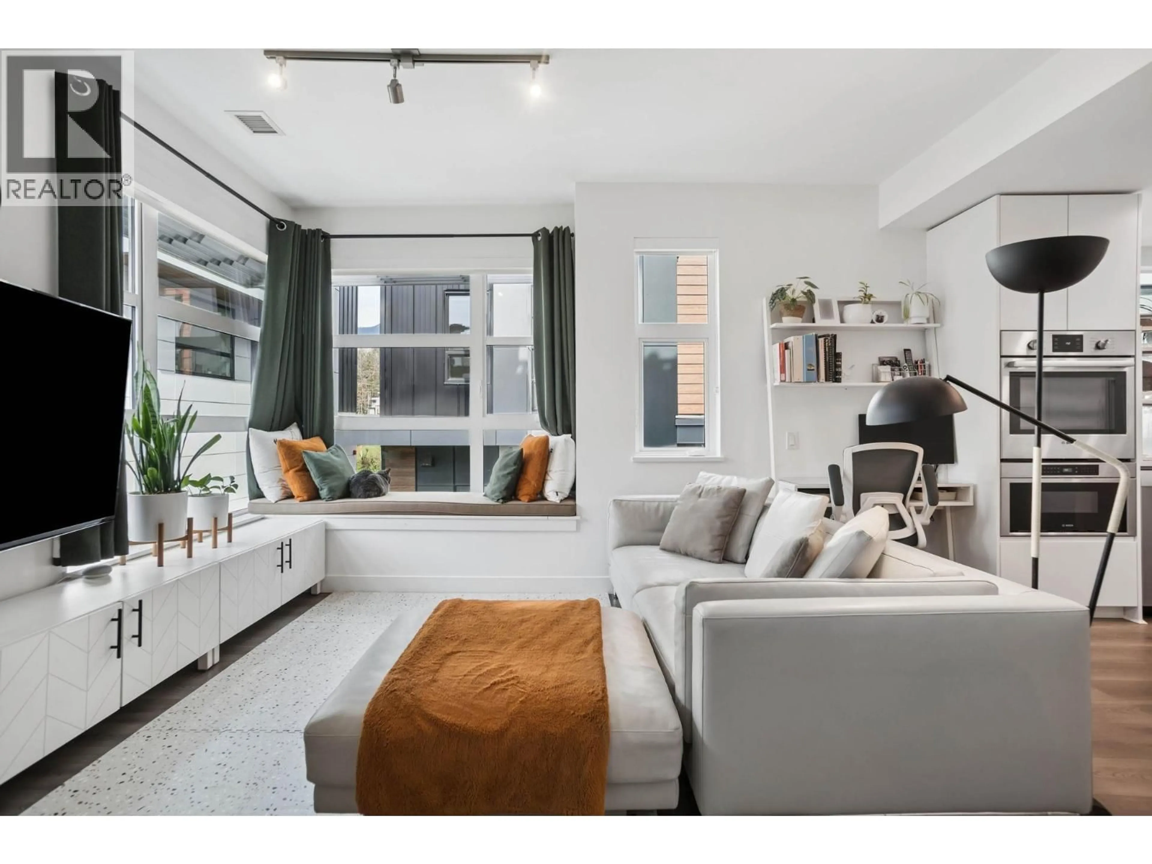 Living room with furniture, unknown for 222 - 2060 CURLING ROAD, North Vancouver British Columbia V7P0E1