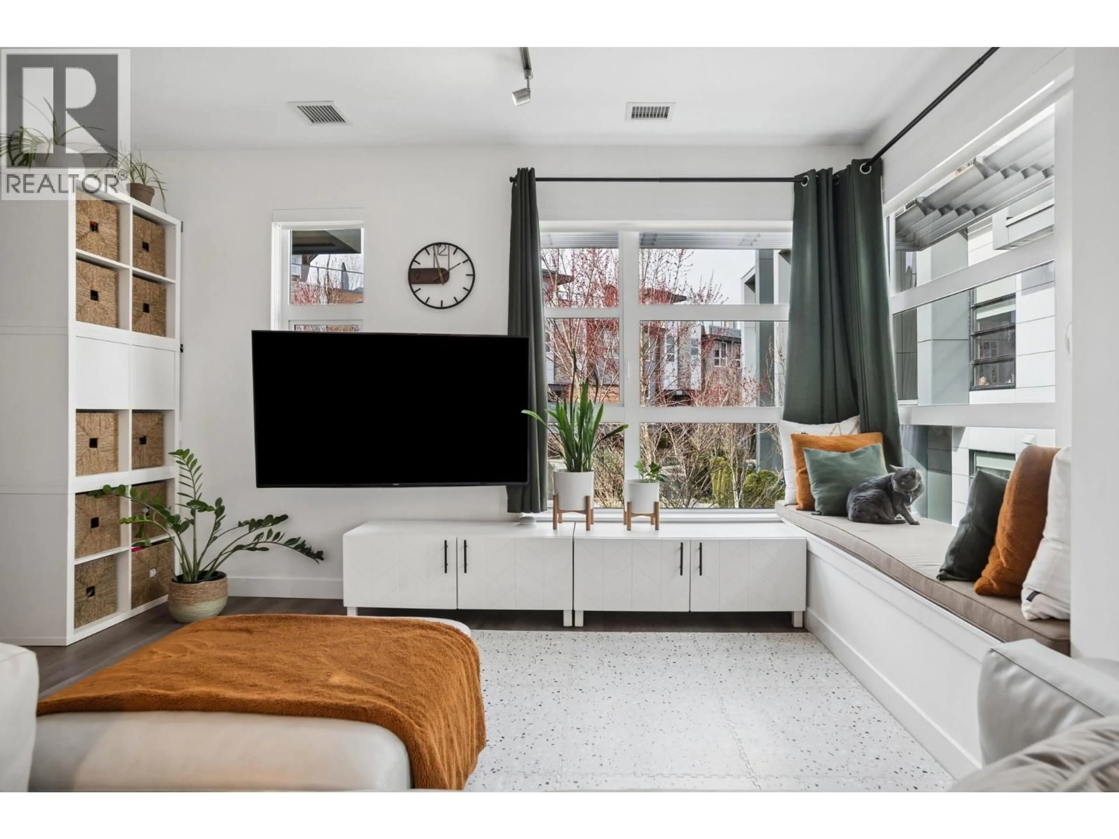 Living room with furniture, ceramic/tile floor for 222 - 2060 CURLING ROAD, North Vancouver British Columbia V7P0E1