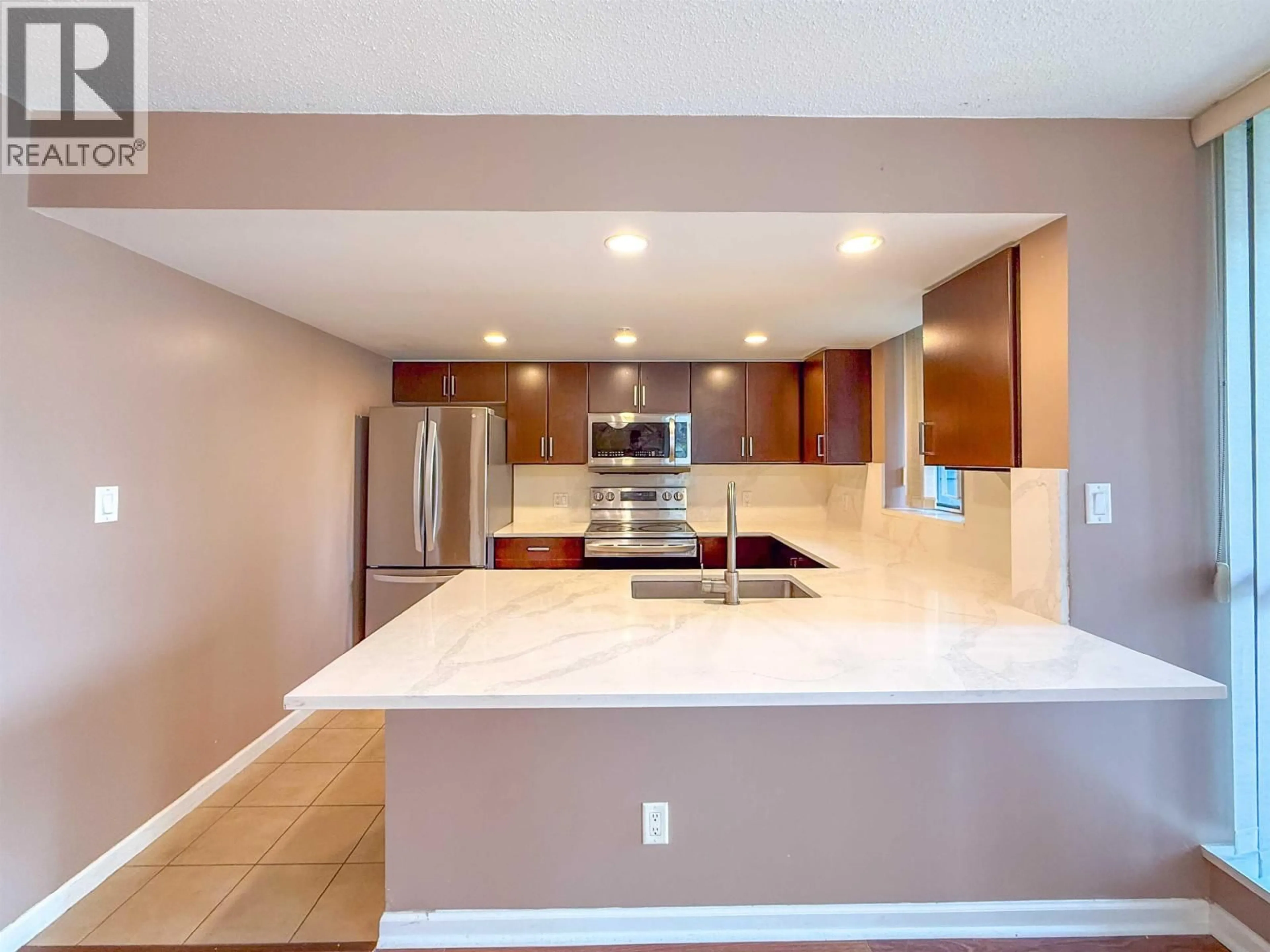 Open concept kitchen, ceramic/tile floor for 201 - 295 GUILDFORD WAY, Port Moody British Columbia V3H5N3