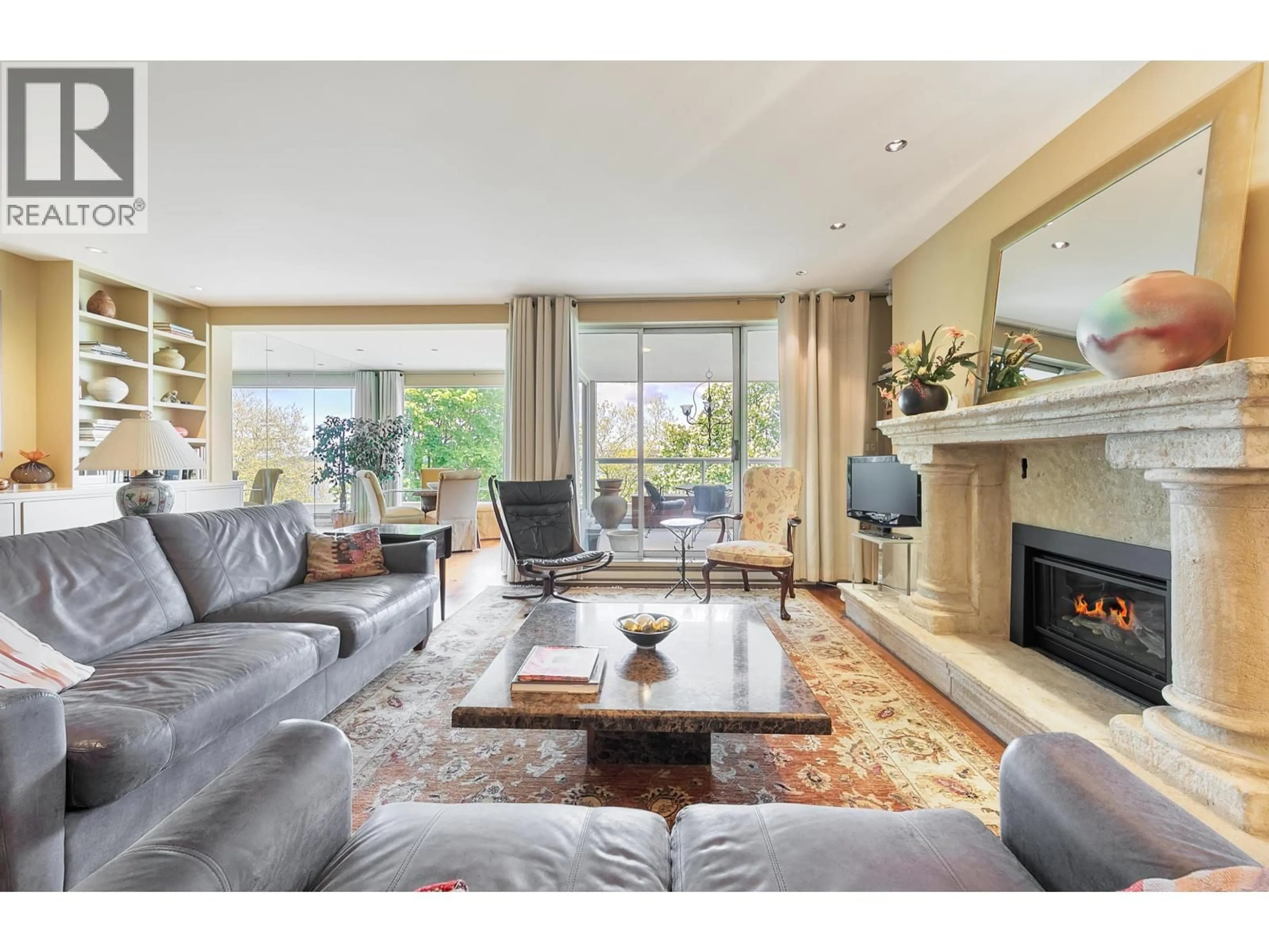 Living room with furniture, wood/laminate floor for 302 - 2015 BEACH AVENUE, Vancouver British Columbia V6G1Z3