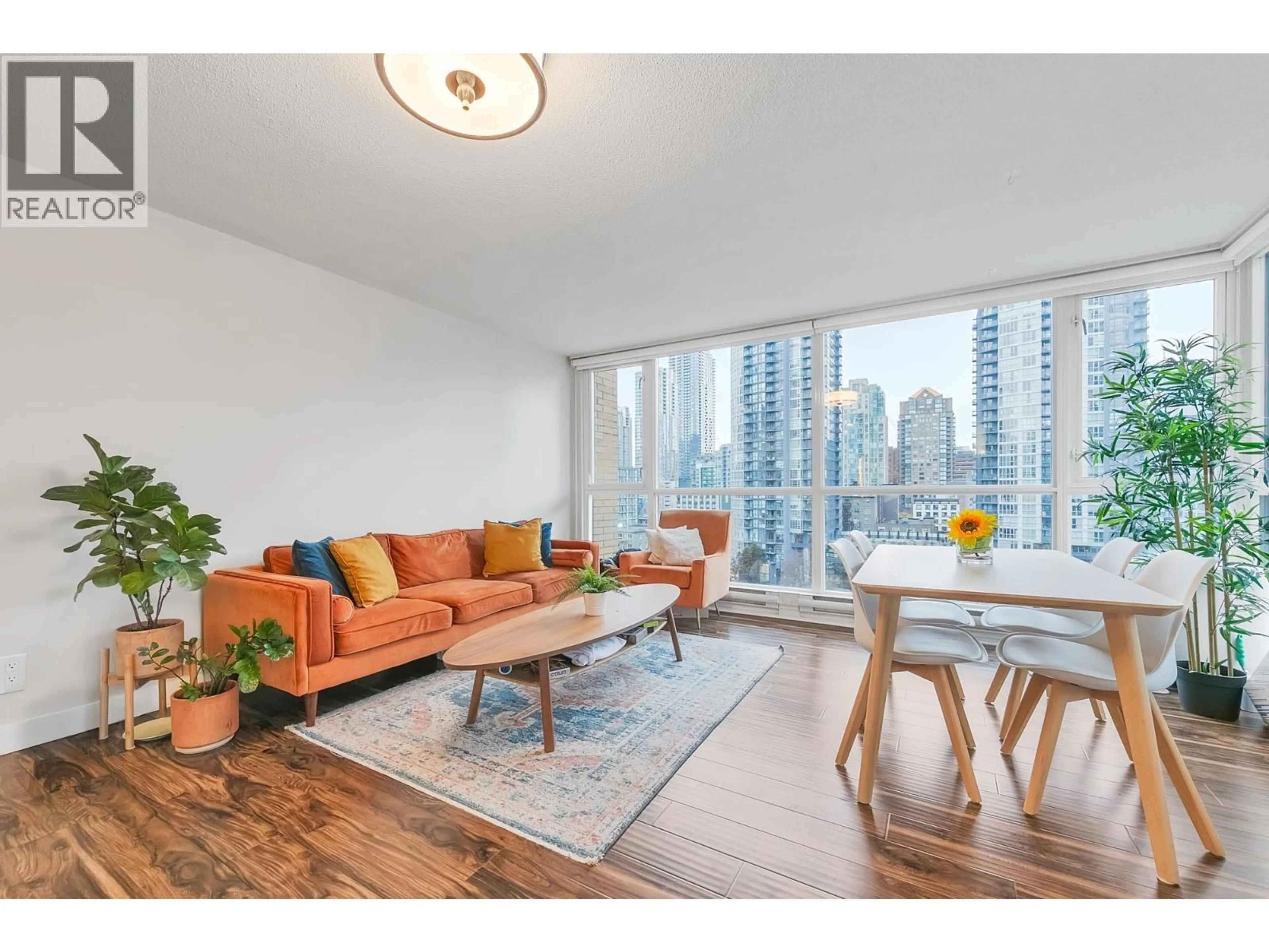 Living room with furniture, wood/laminate floor for 1003 - 1188 RICHARDS STREET, Vancouver British Columbia V6B3E6