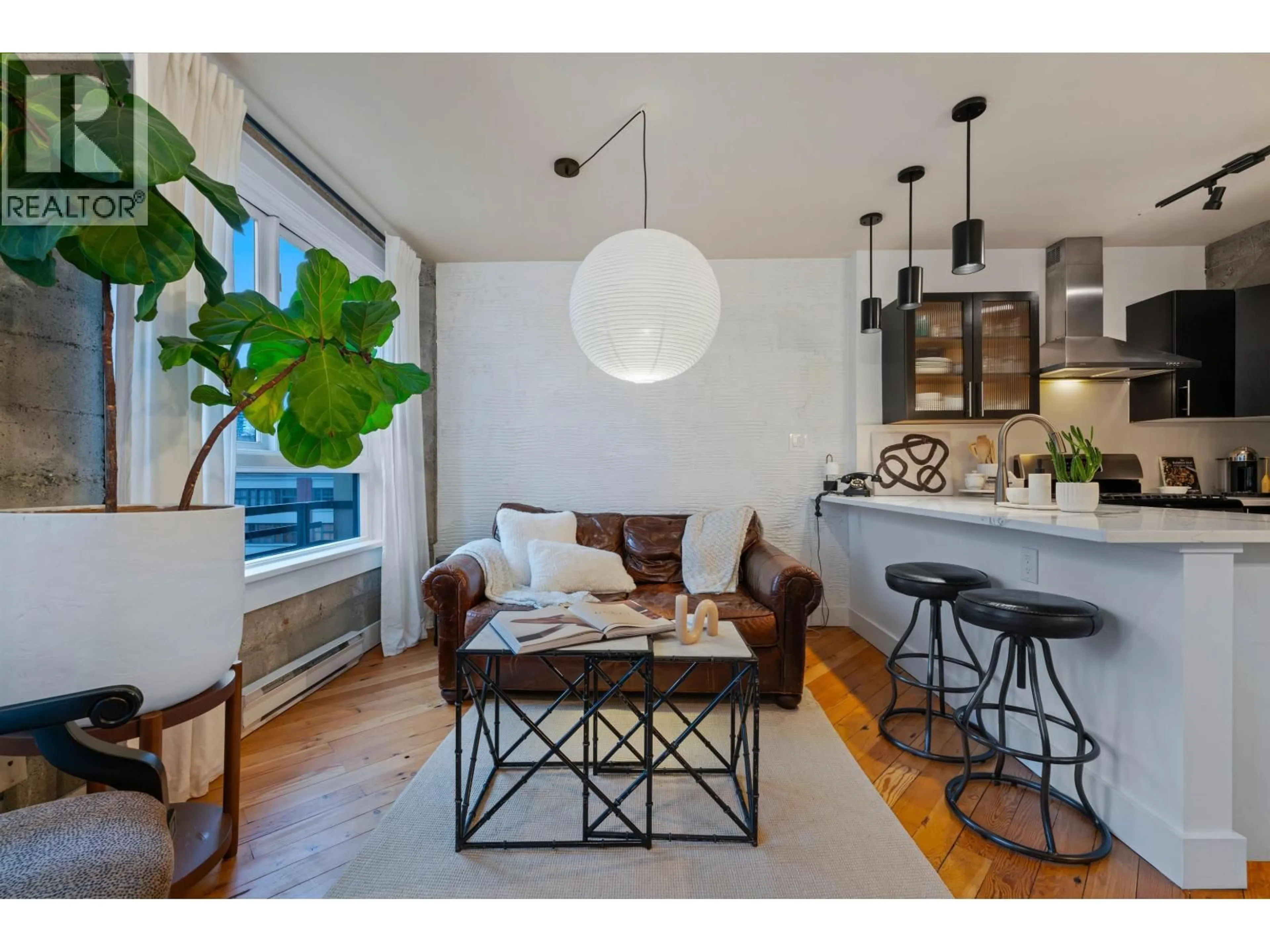 Living room with furniture, wood/laminate floor for 406 - 1216 HOMER STREET, Vancouver British Columbia V6B6K5