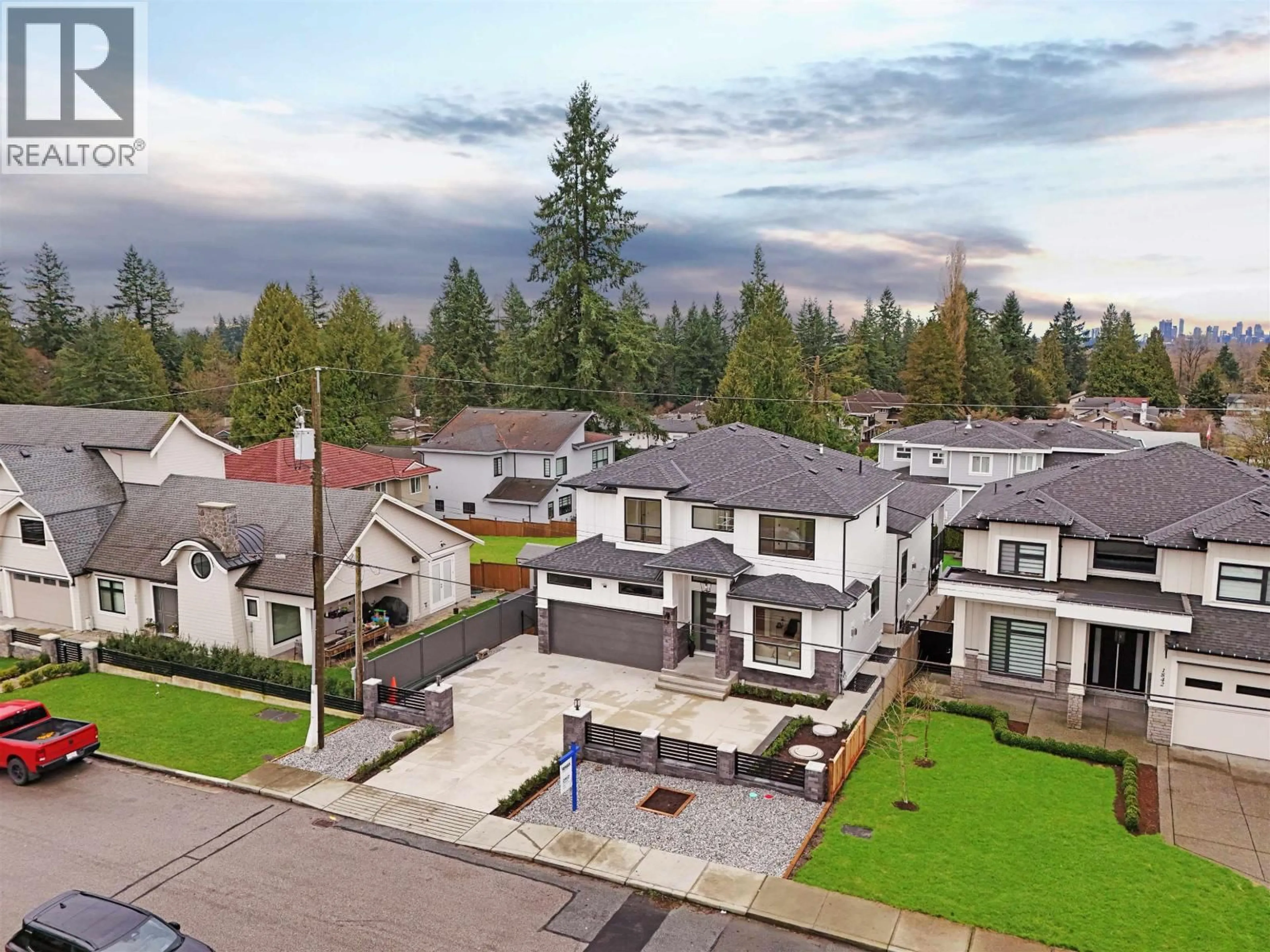 A pic from outside/outdoor area/front of a property/back of a property/a pic from drone, mountain view for 1846 LEMAX AVENUE, Coquitlam British Columbia V3J2C6