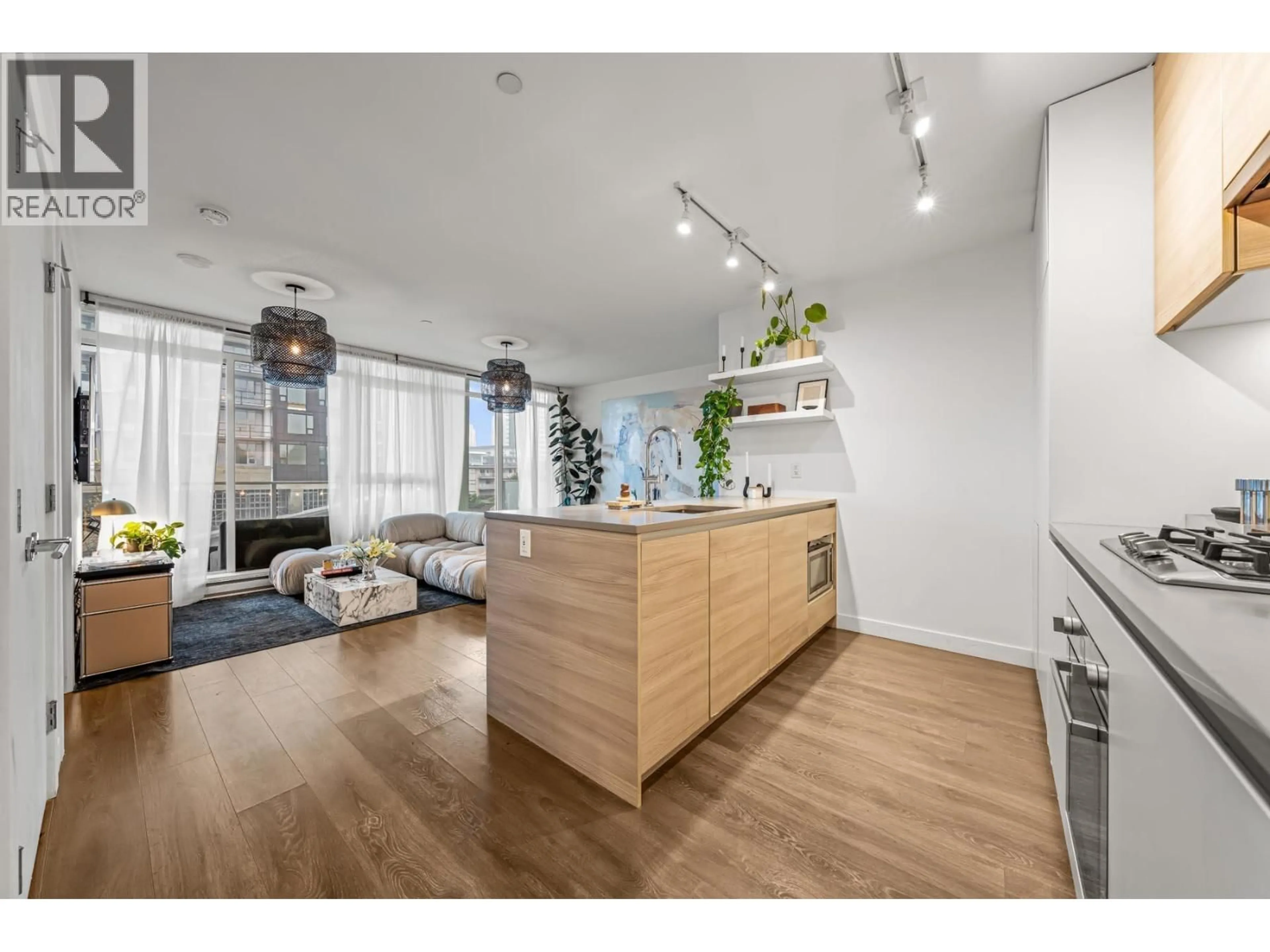 Open concept kitchen, wood/laminate floor for 504 - 652 WHITING WAY, Coquitlam British Columbia V3J0K3