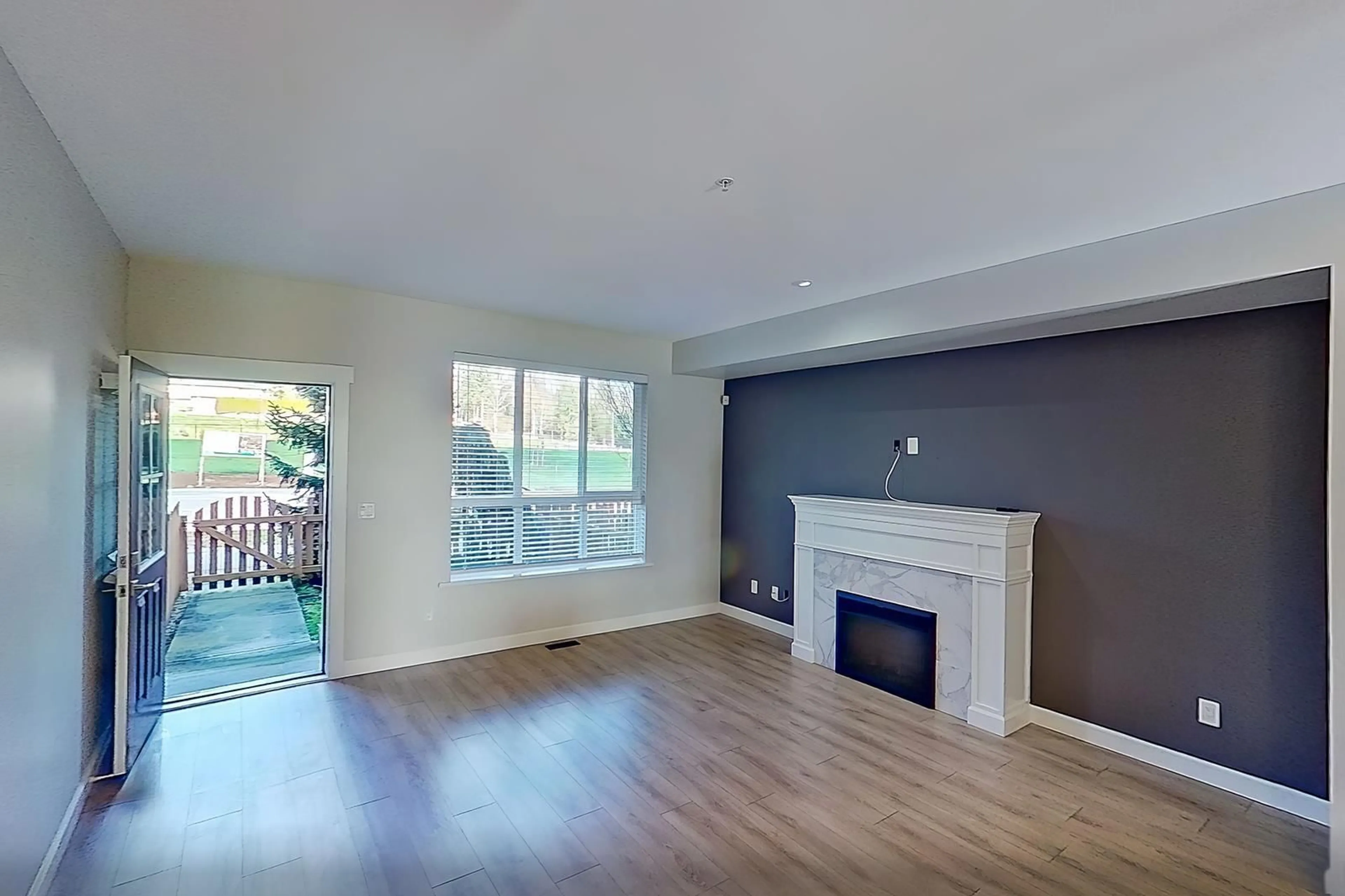 Living room with furniture, wood/laminate floor for 53 - 7157 210 STREET, Langley British Columbia V2Y0T3