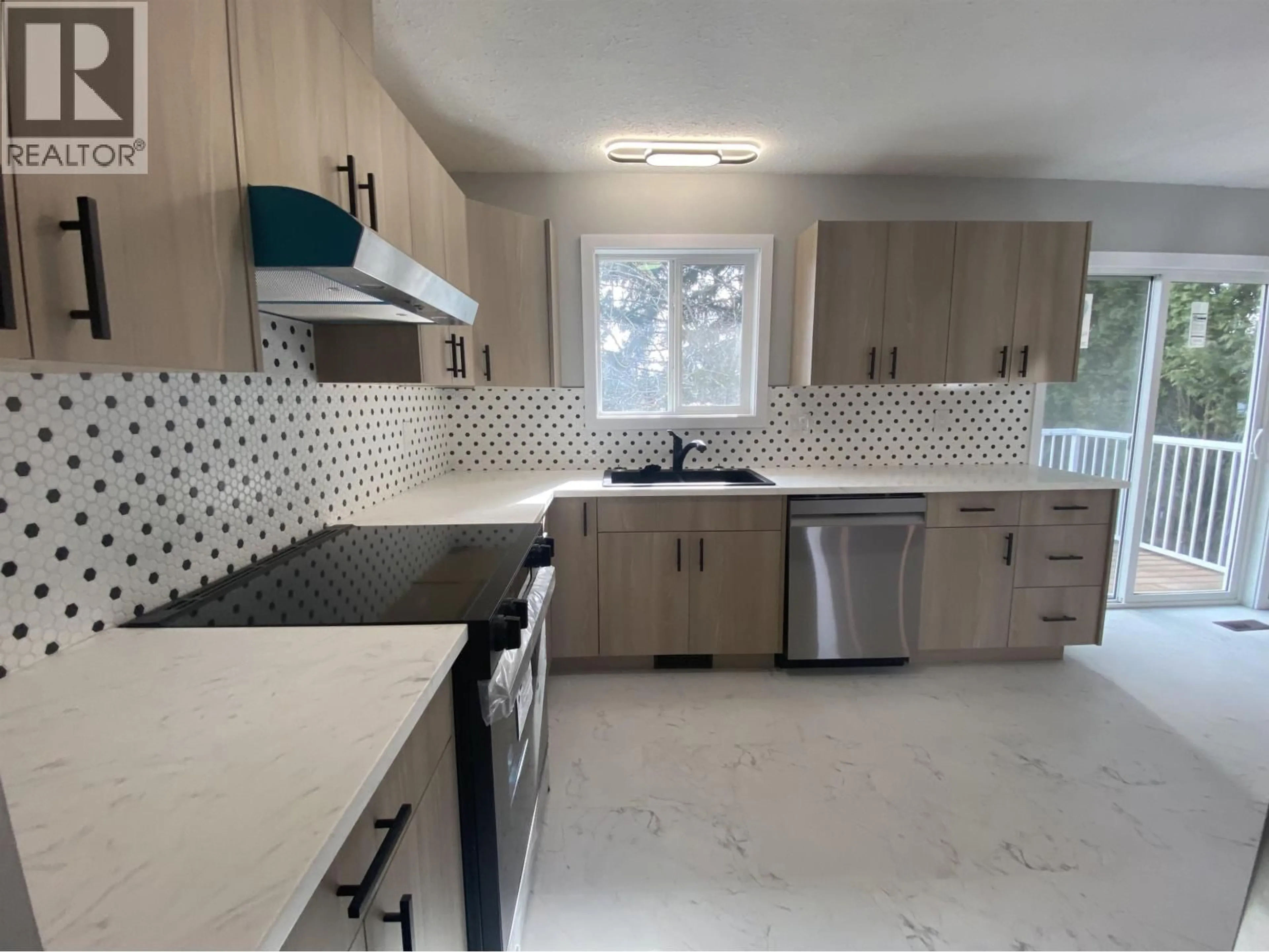 Open concept kitchen, ceramic/tile floor for 4615 TUCK AVENUE, Terrace British Columbia V8G2G3