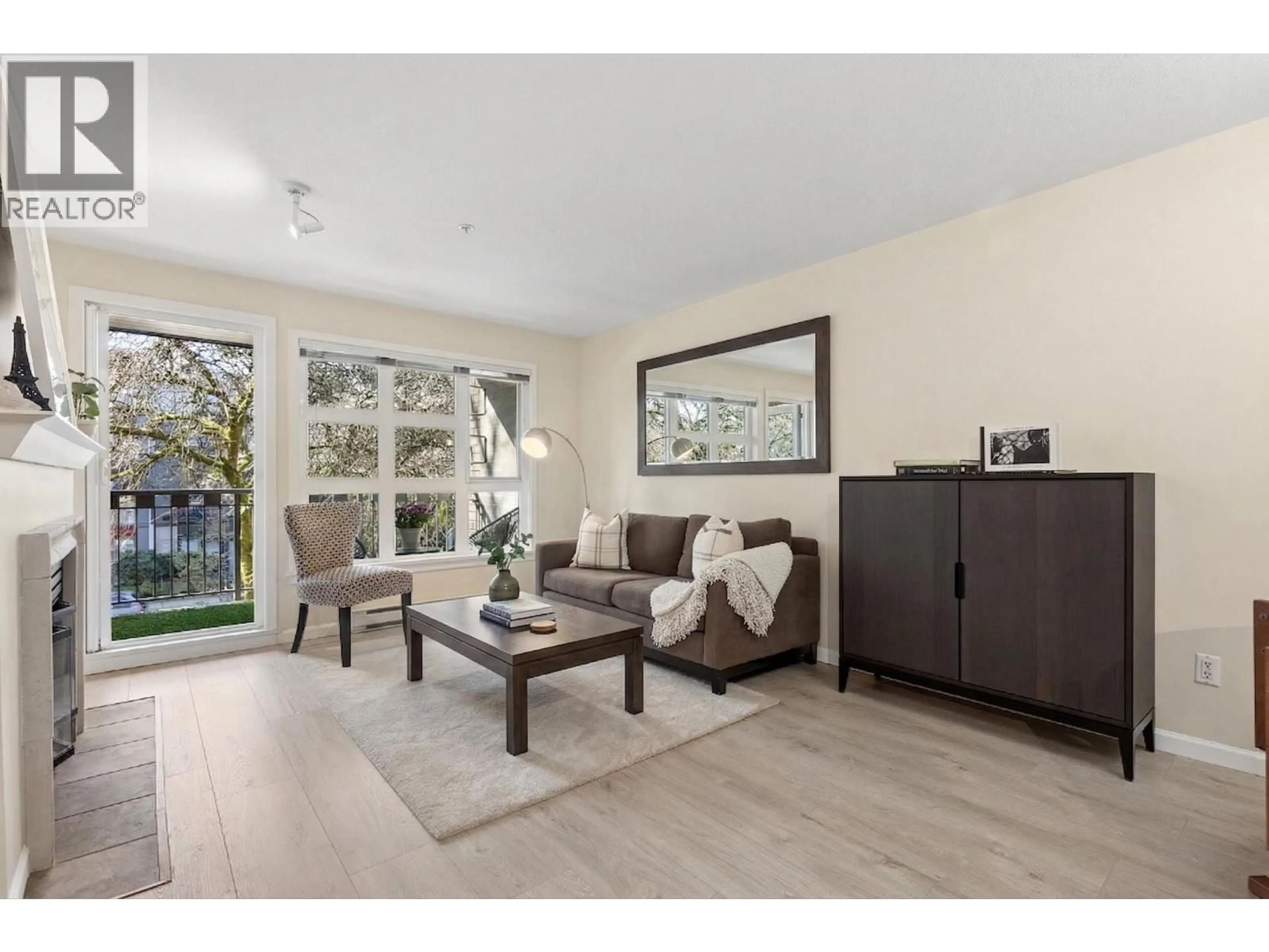 Living room with furniture, wood/laminate floor for 211 - 2161 12TH AVENUE, Vancouver British Columbia V6K4S7