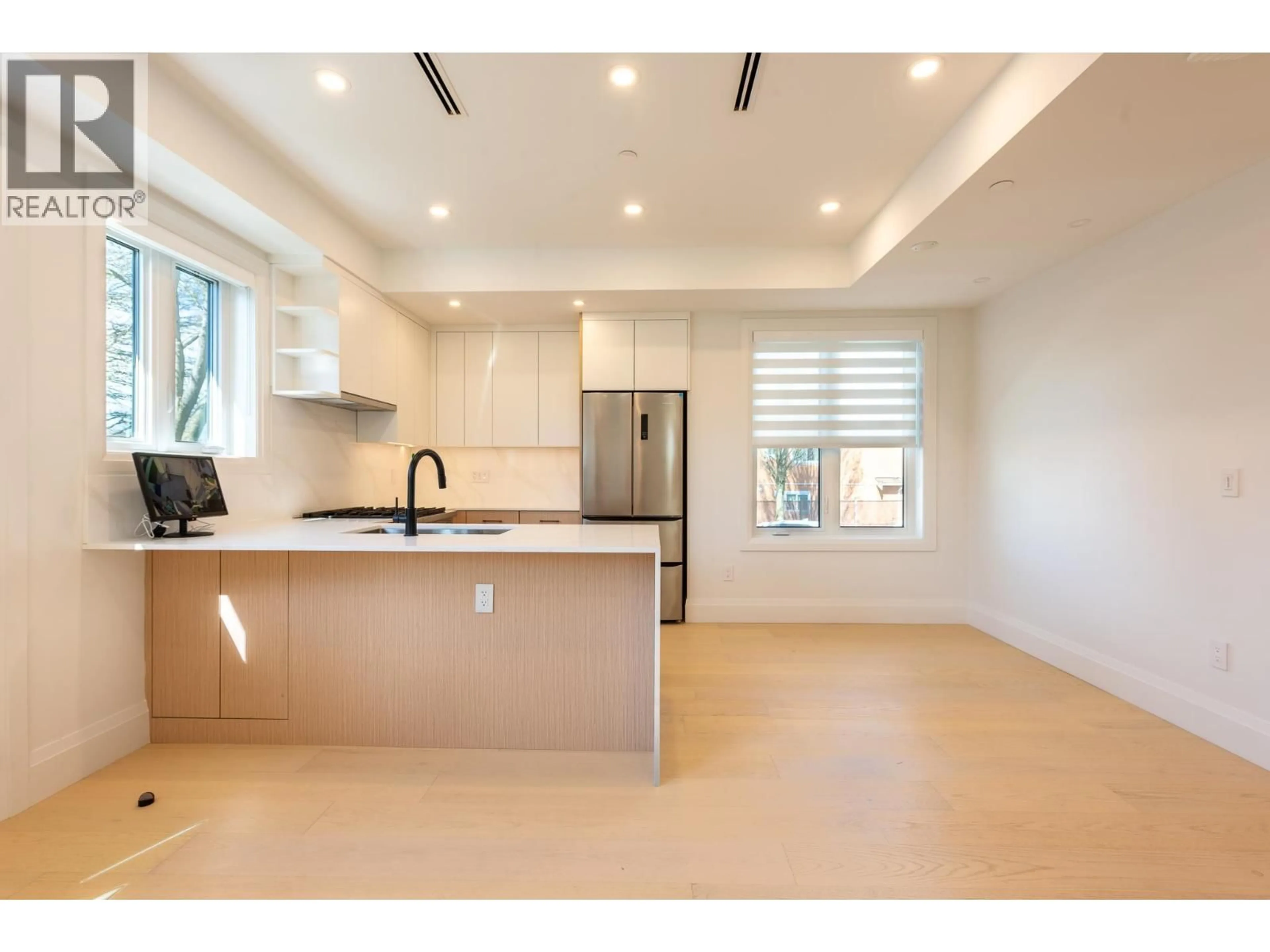 Open concept kitchen, ceramic/tile floor for 2890 GRANT STREET, Vancouver British Columbia V5K4C8