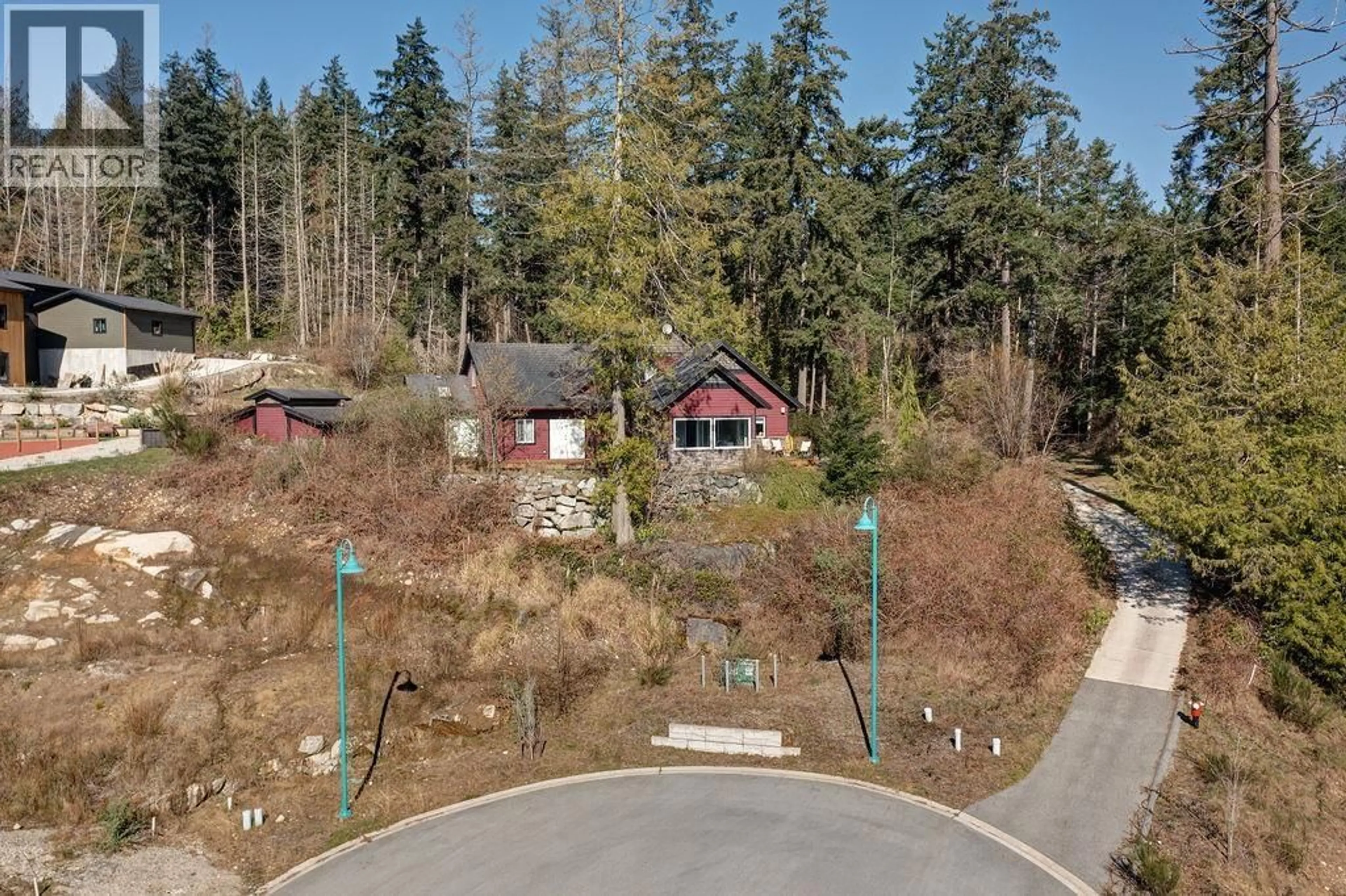 A pic from outside/outdoor area/front of a property/back of a property/a pic from drone, forest/trees view for 5628 MEDUSA PLACE, Sechelt British Columbia V0N3A3