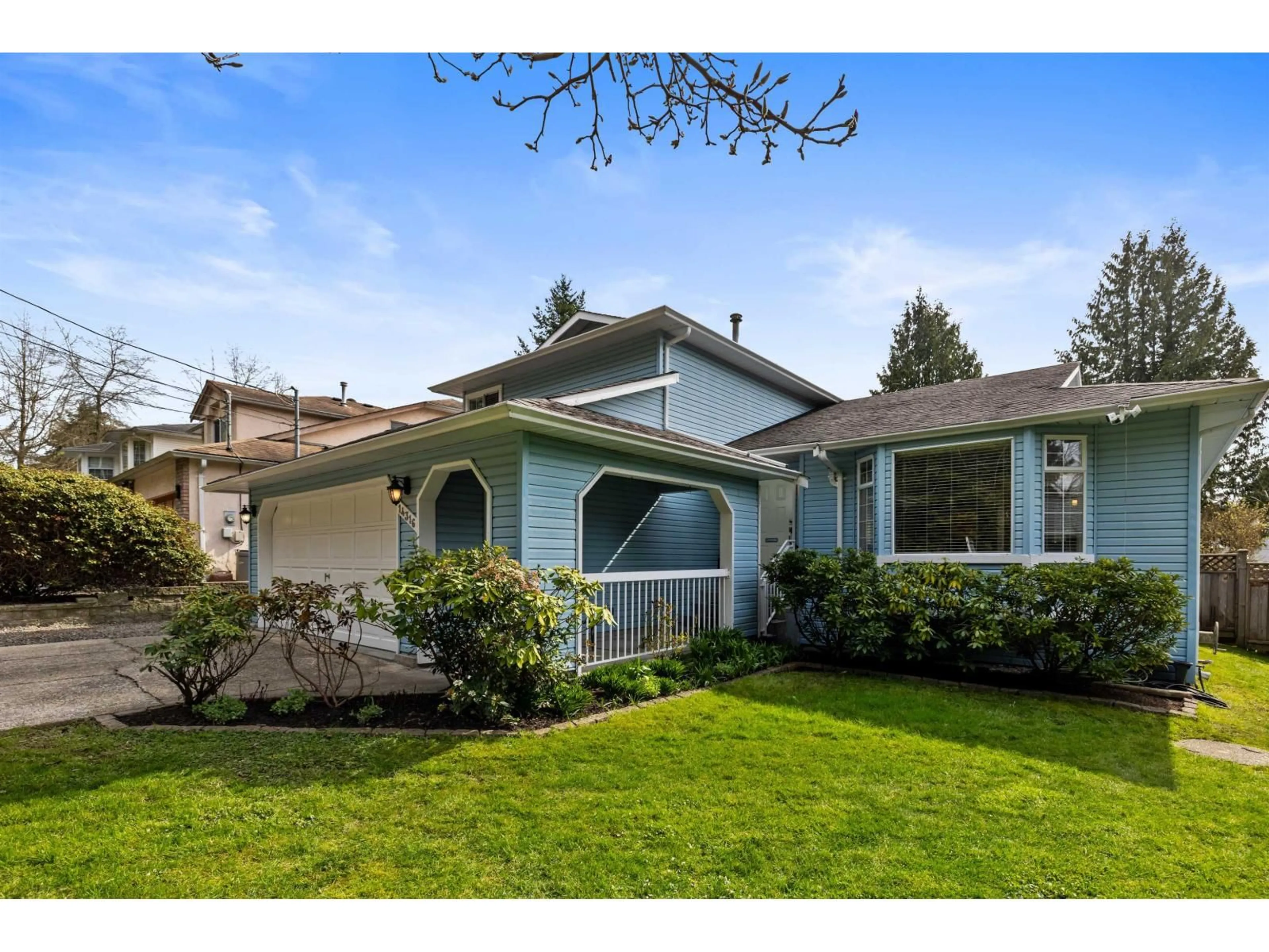 Home with vinyl exterior material, street for 14316 92 AVENUE, Surrey British Columbia V3V1J6