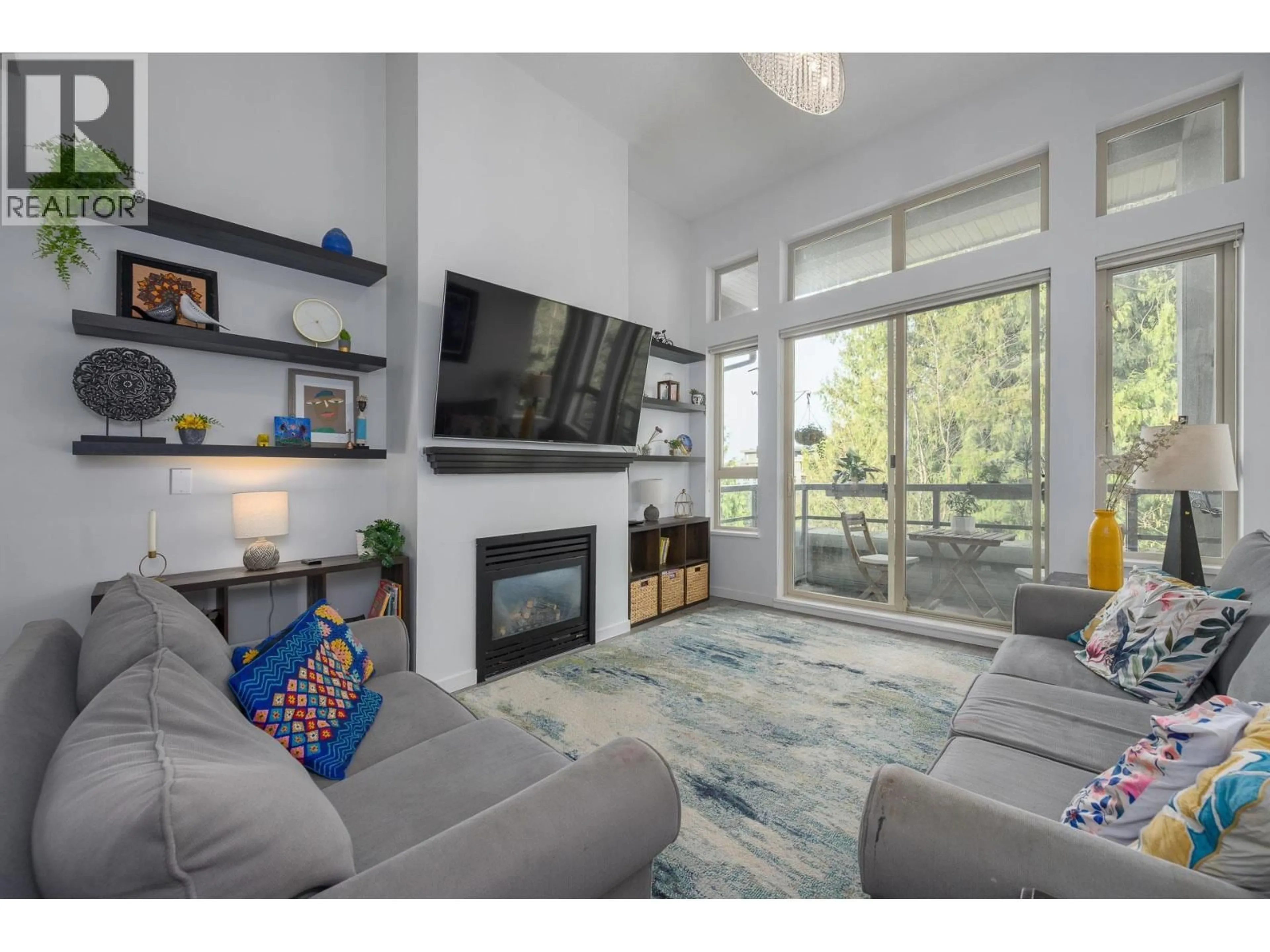 Living room with furniture, unknown for 409 - 9329 UNIVERSITY CRESCENT, Burnaby British Columbia V5A4Y4