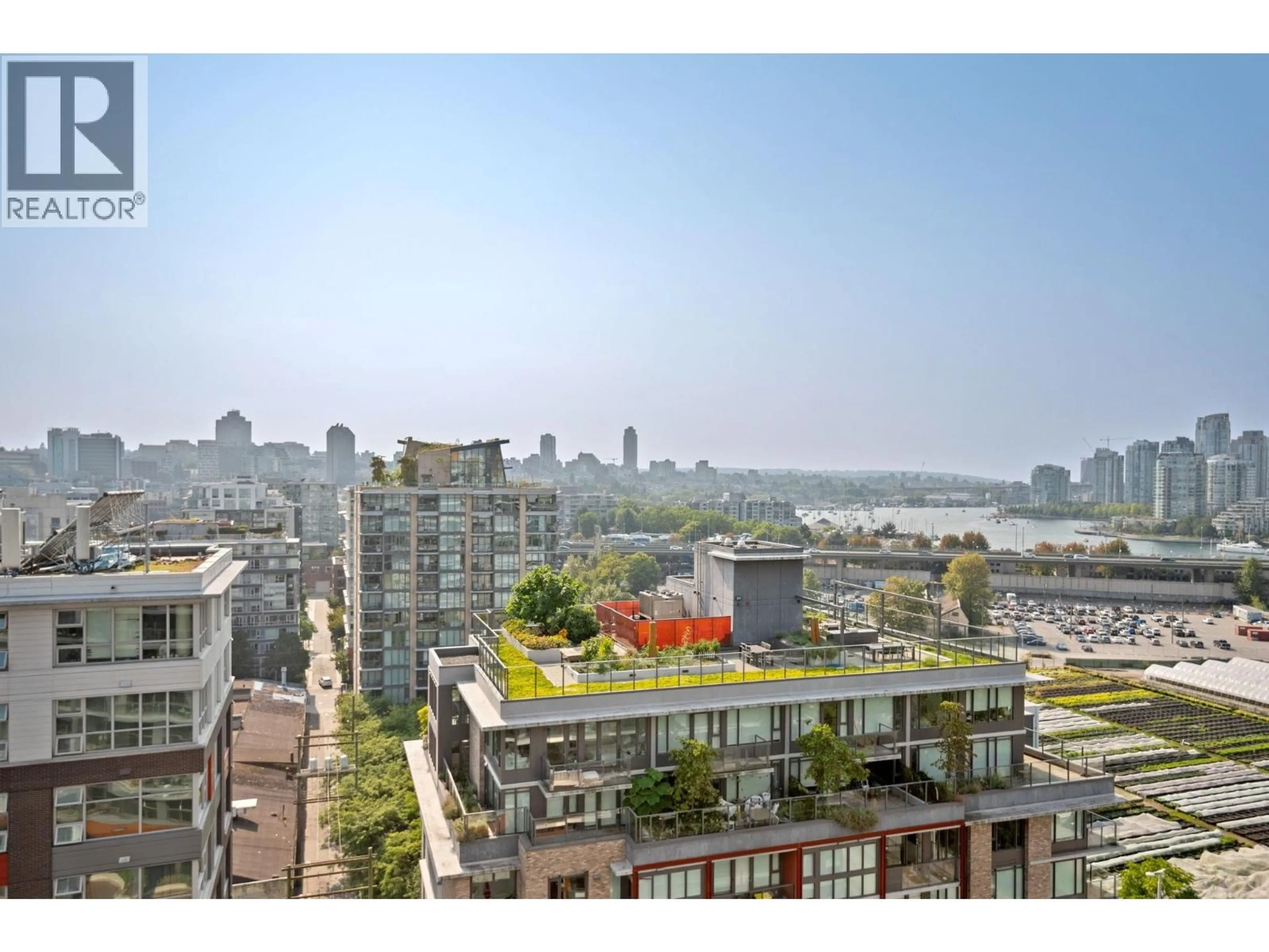 Balcony in the apartment, city buildings view from balcony for 1501 - 1768 COOK STREET, Vancouver British Columbia V5Y0N3