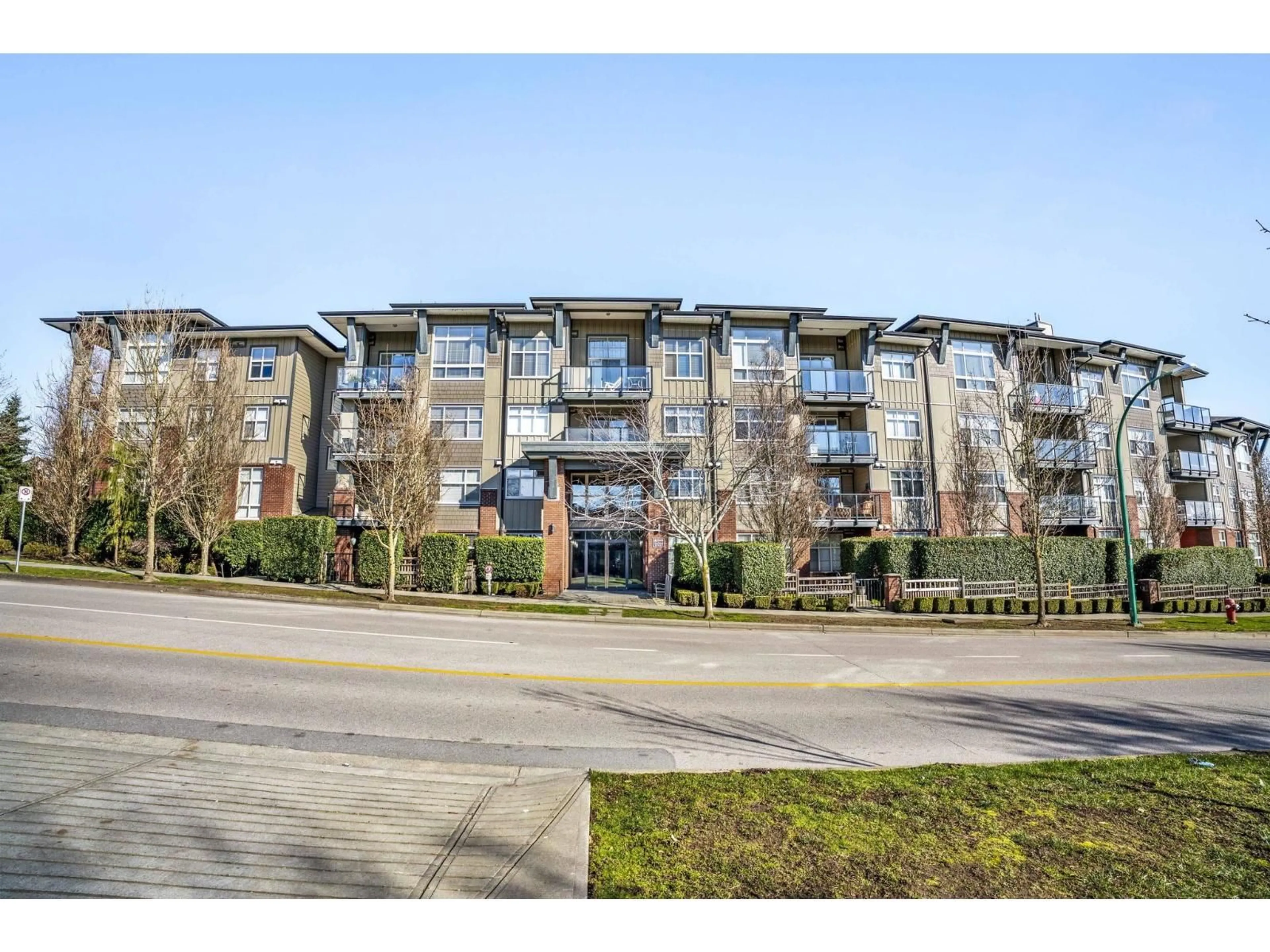 A pic from outside/outdoor area/front of a property/back of a property/a pic from drone, unknown for 201 - 19201 66A AVENUE, Surrey British Columbia V4N6N7