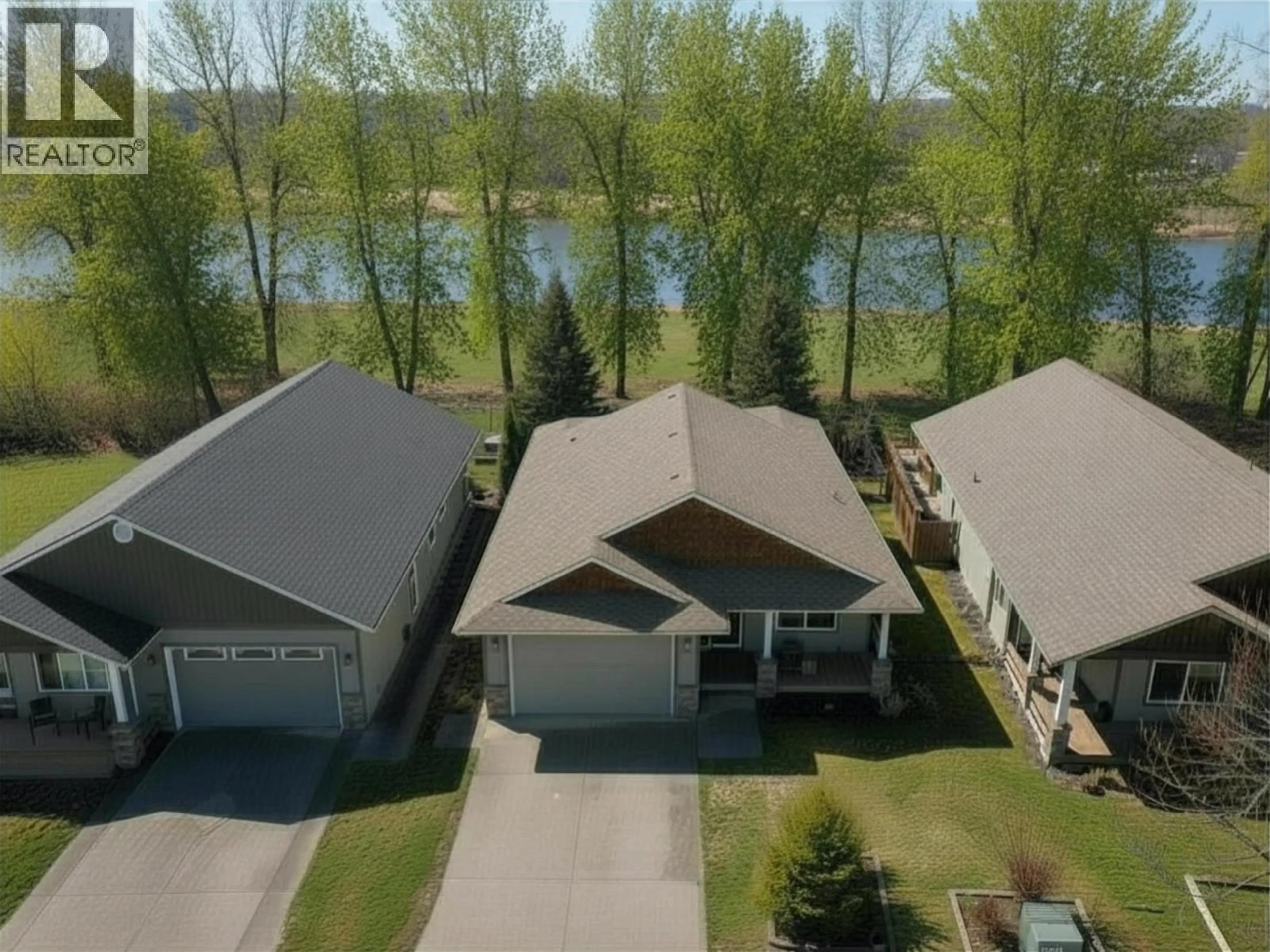 A pic from outside/outdoor area/front of a property/back of a property/a pic from drone, water/lake/river/ocean view for 132 - 1702 DYKE ROAD, Quesnel British Columbia V2J6A4