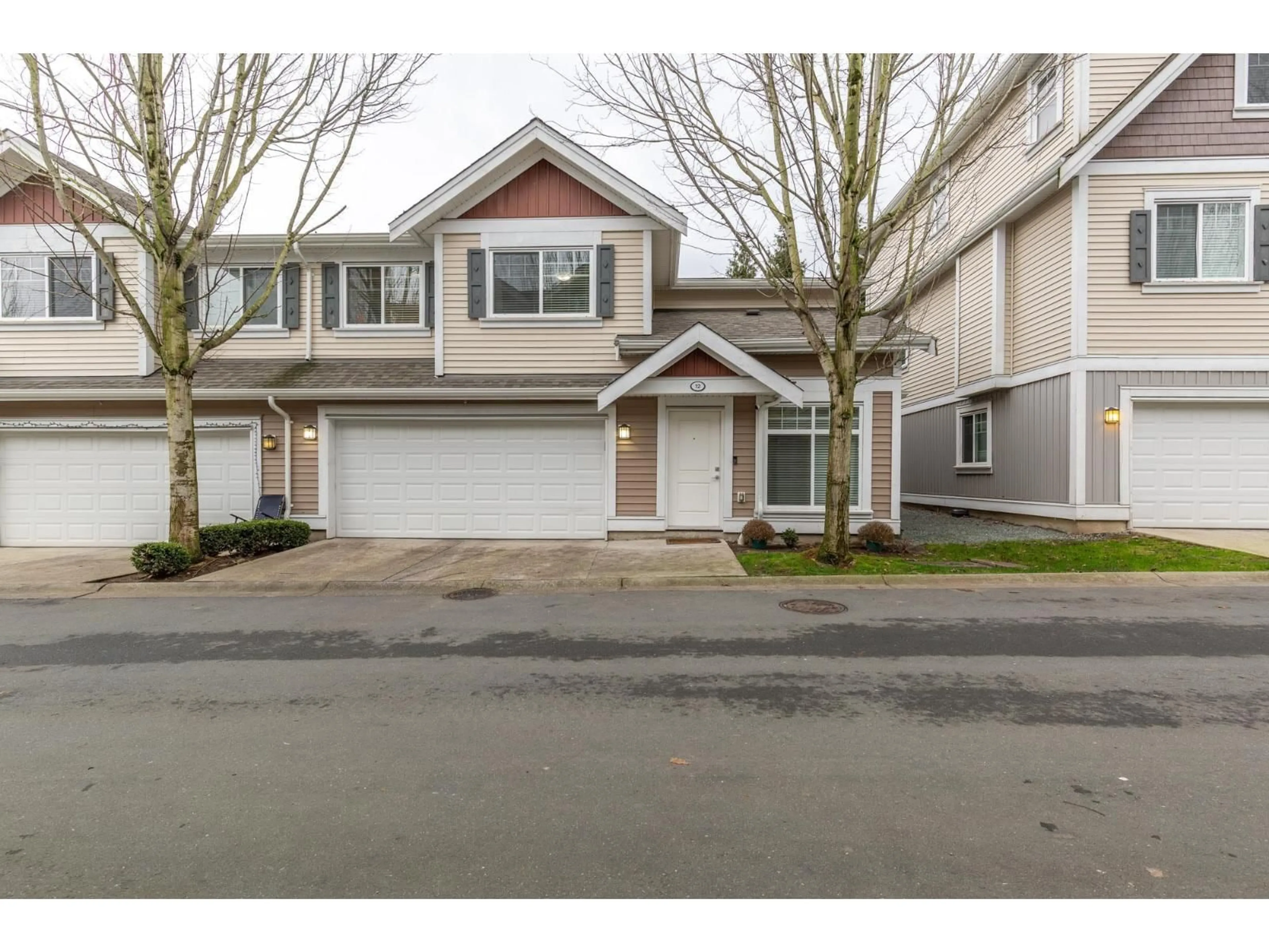 Home with vinyl exterior material, street for 12 - 30748 CARDINAL AVENUE, Abbotsford British Columbia V2T0C1