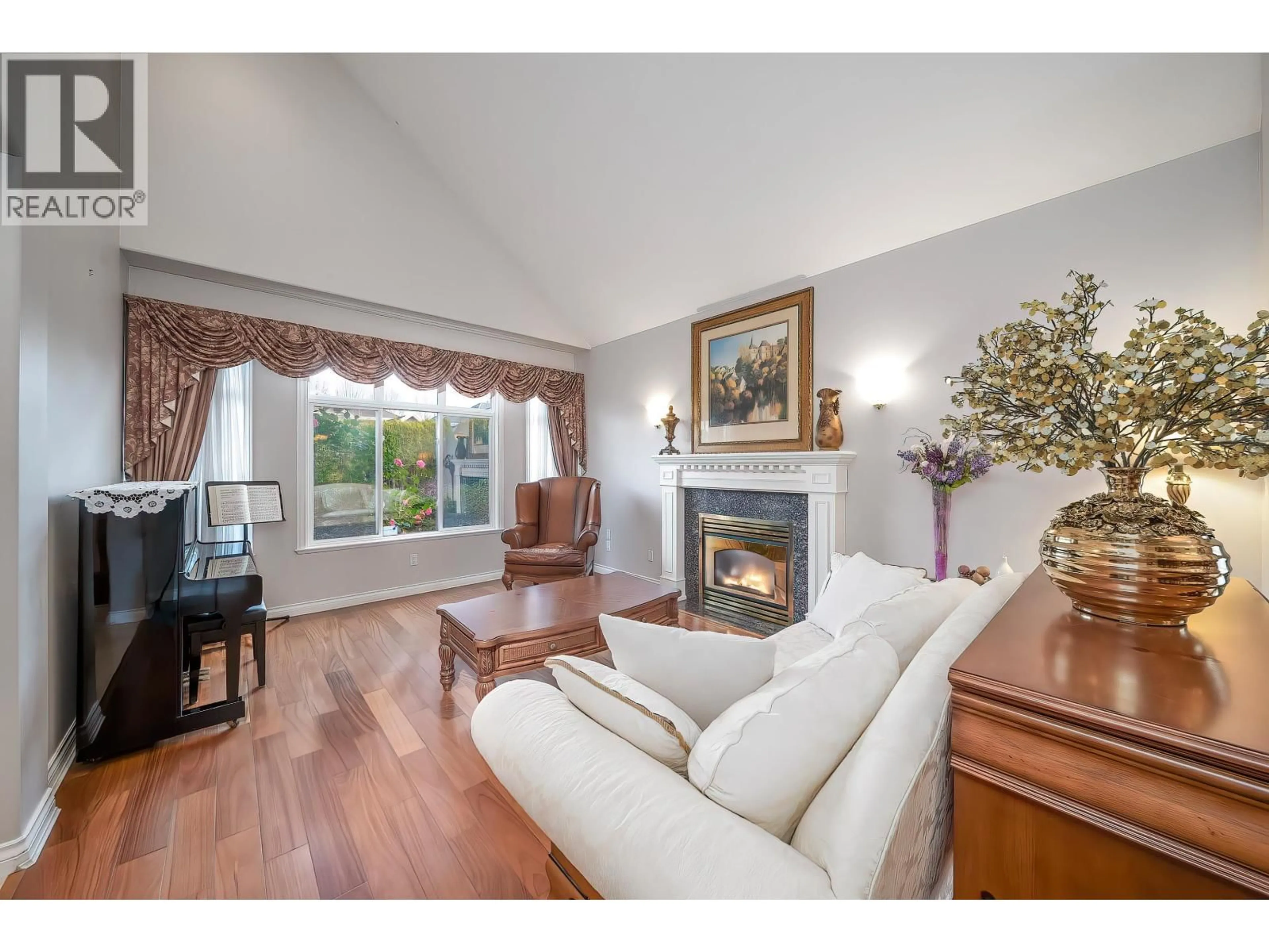 Living room with furniture, wood/laminate floor for 8320 MOWBRAY ROAD, Richmond British Columbia V7A2B7