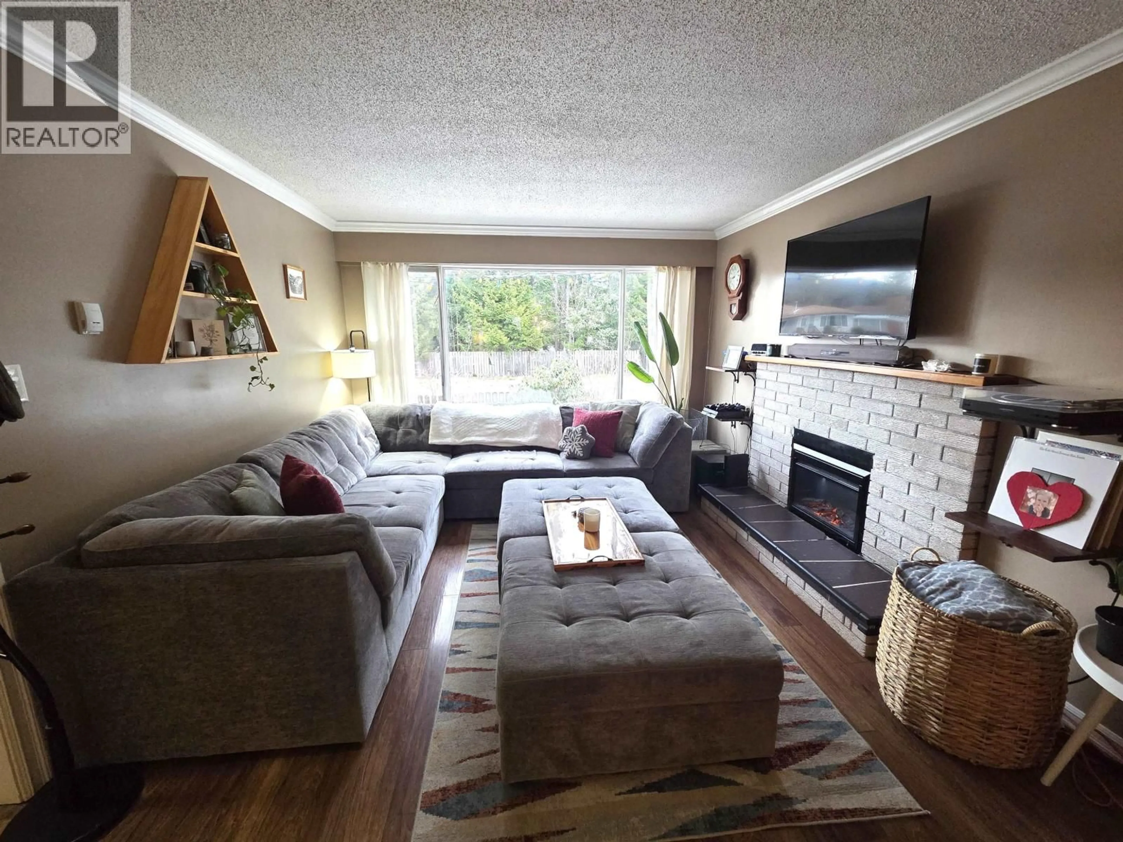 Living room with furniture, wood/laminate floor for 3309 THOMAS STREET, Terrace British Columbia V8G3G4