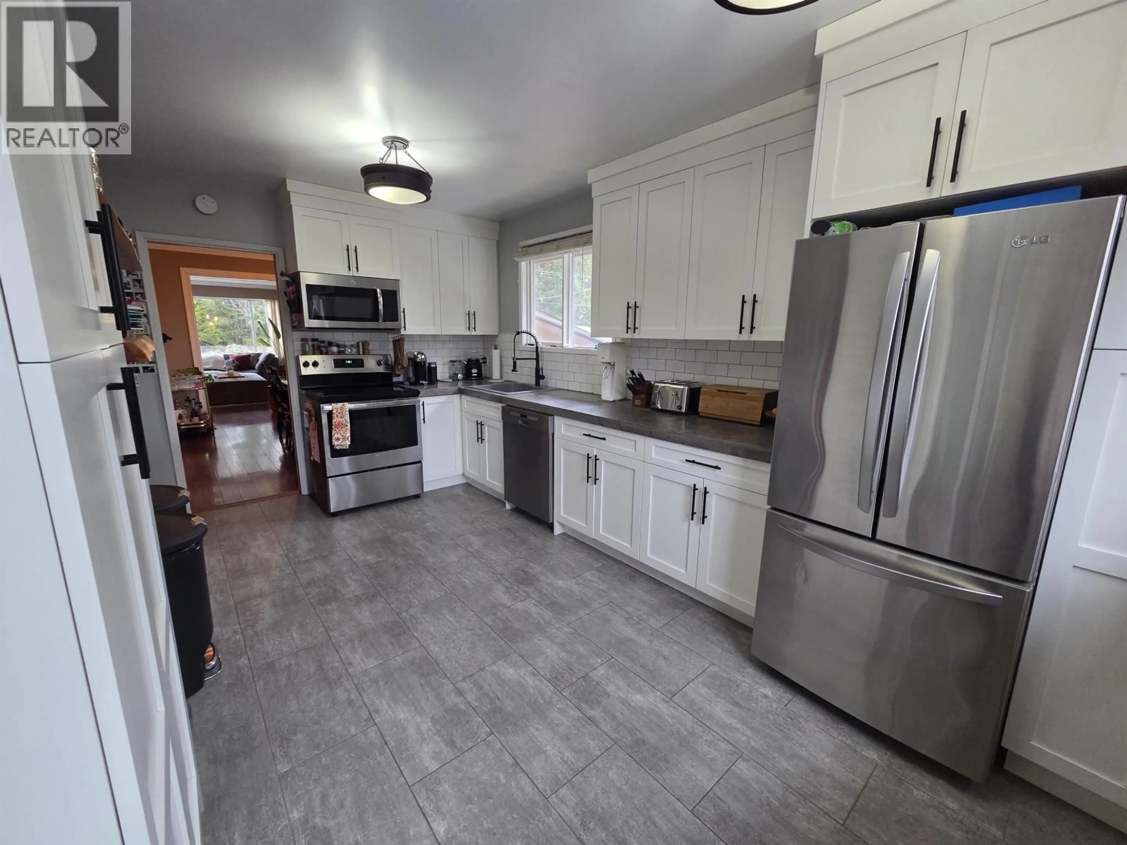 Open concept kitchen, ceramic/tile floor for 3309 THOMAS STREET, Terrace British Columbia V8G3G4