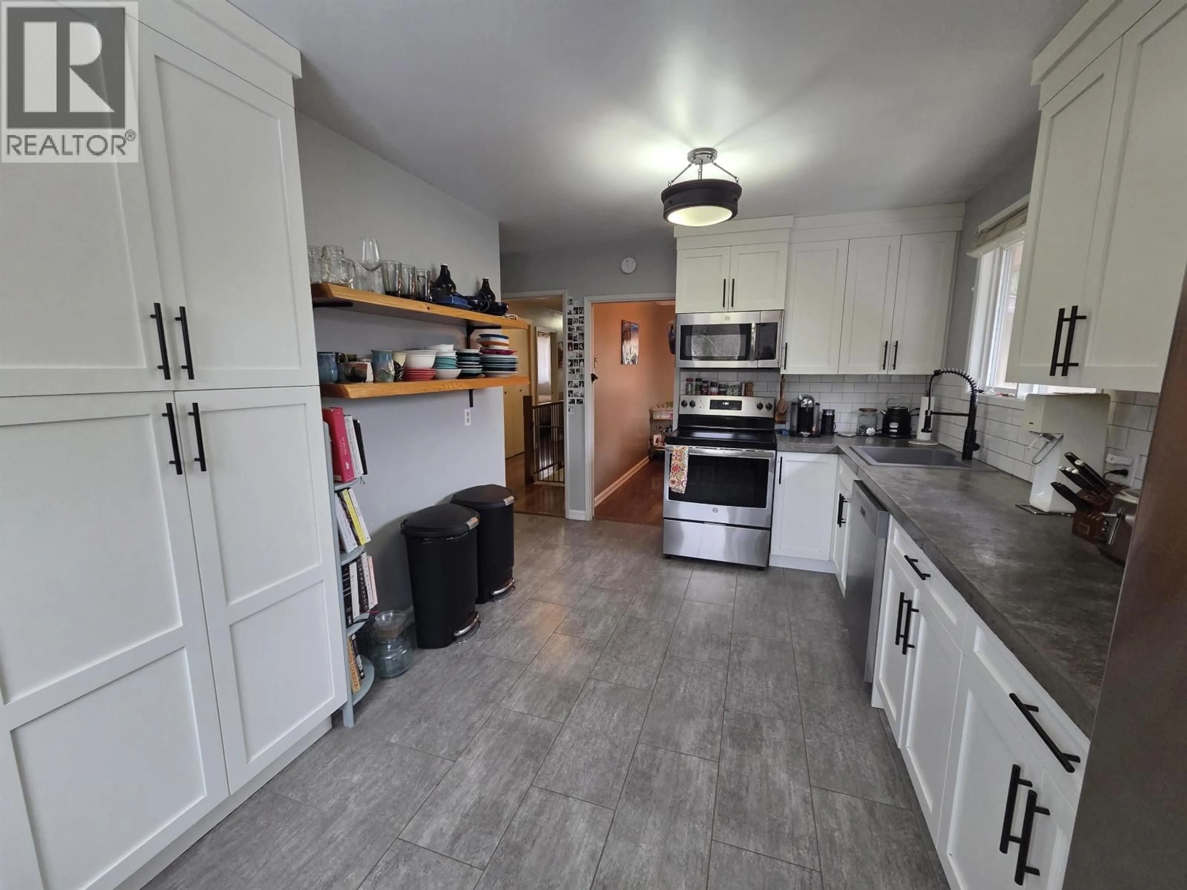 Open concept kitchen, ceramic/tile floor for 3309 THOMAS STREET, Terrace British Columbia V8G3G4