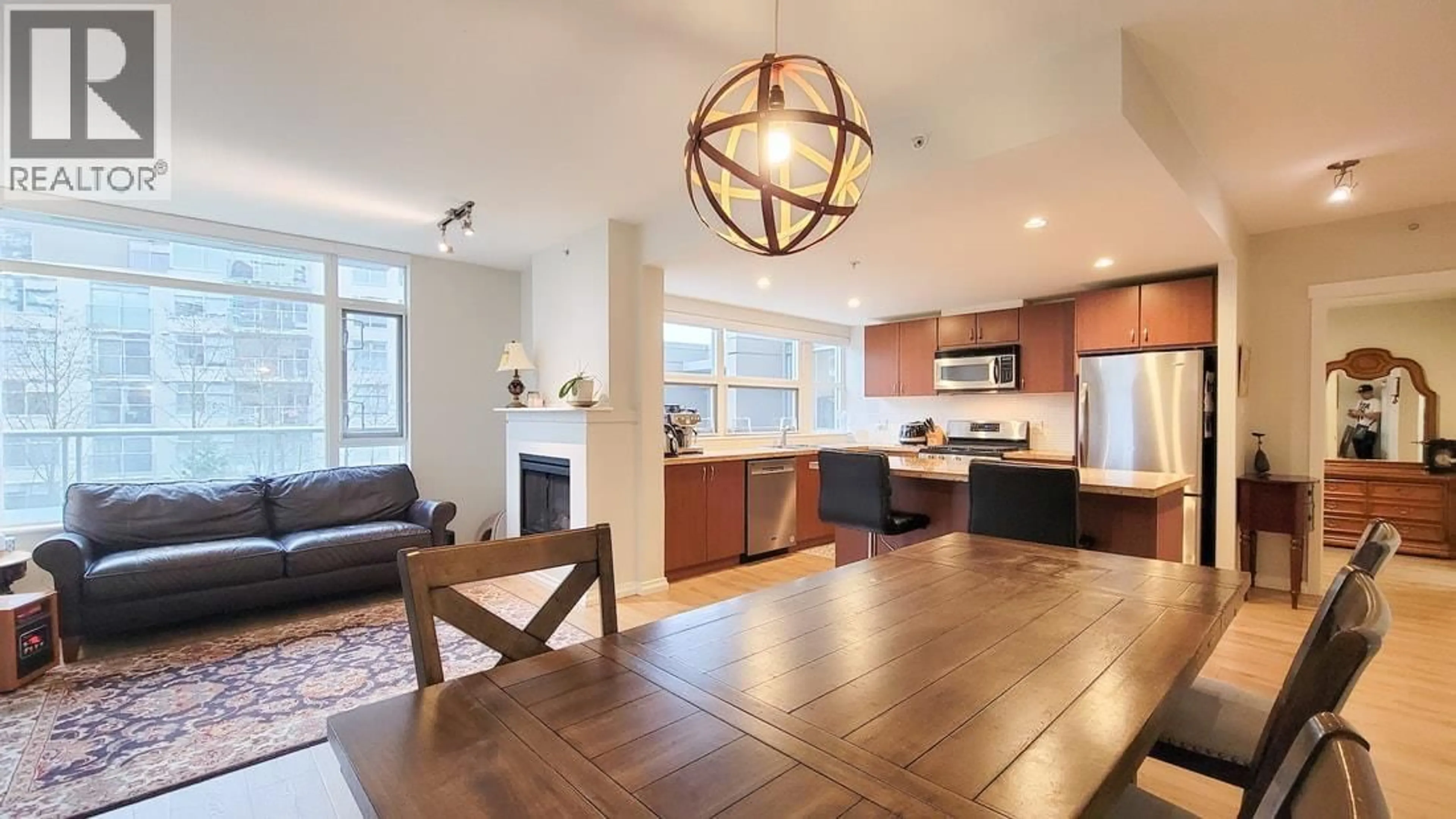 Open concept kitchen, unknown for 301 - 9266 UNIVERSITY CRESCENT, Burnaby British Columbia V5A4Z1