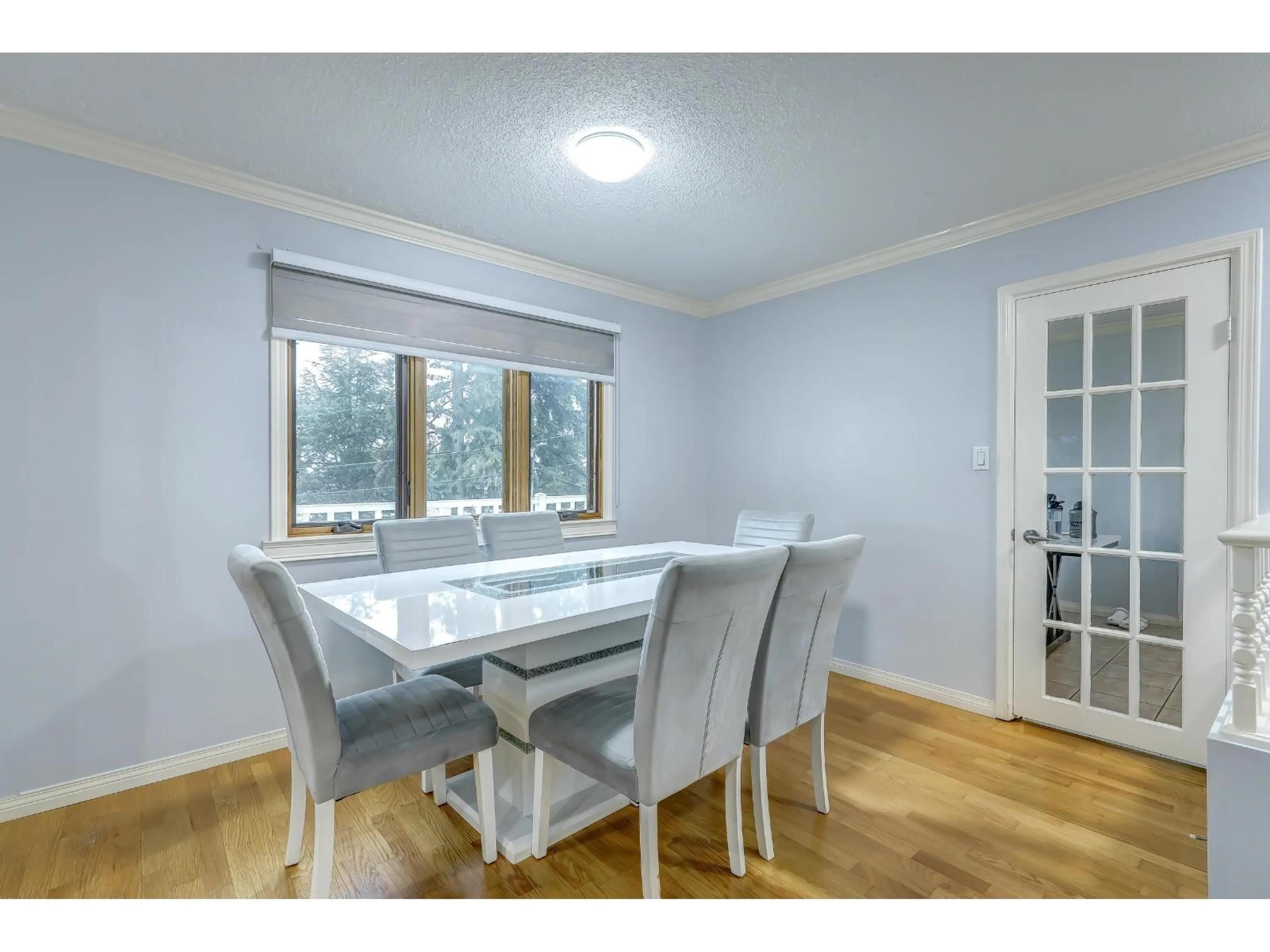Dining room, wood/laminate floor for 7554 FILEY DRIVE, Delta British Columbia V4C6W4