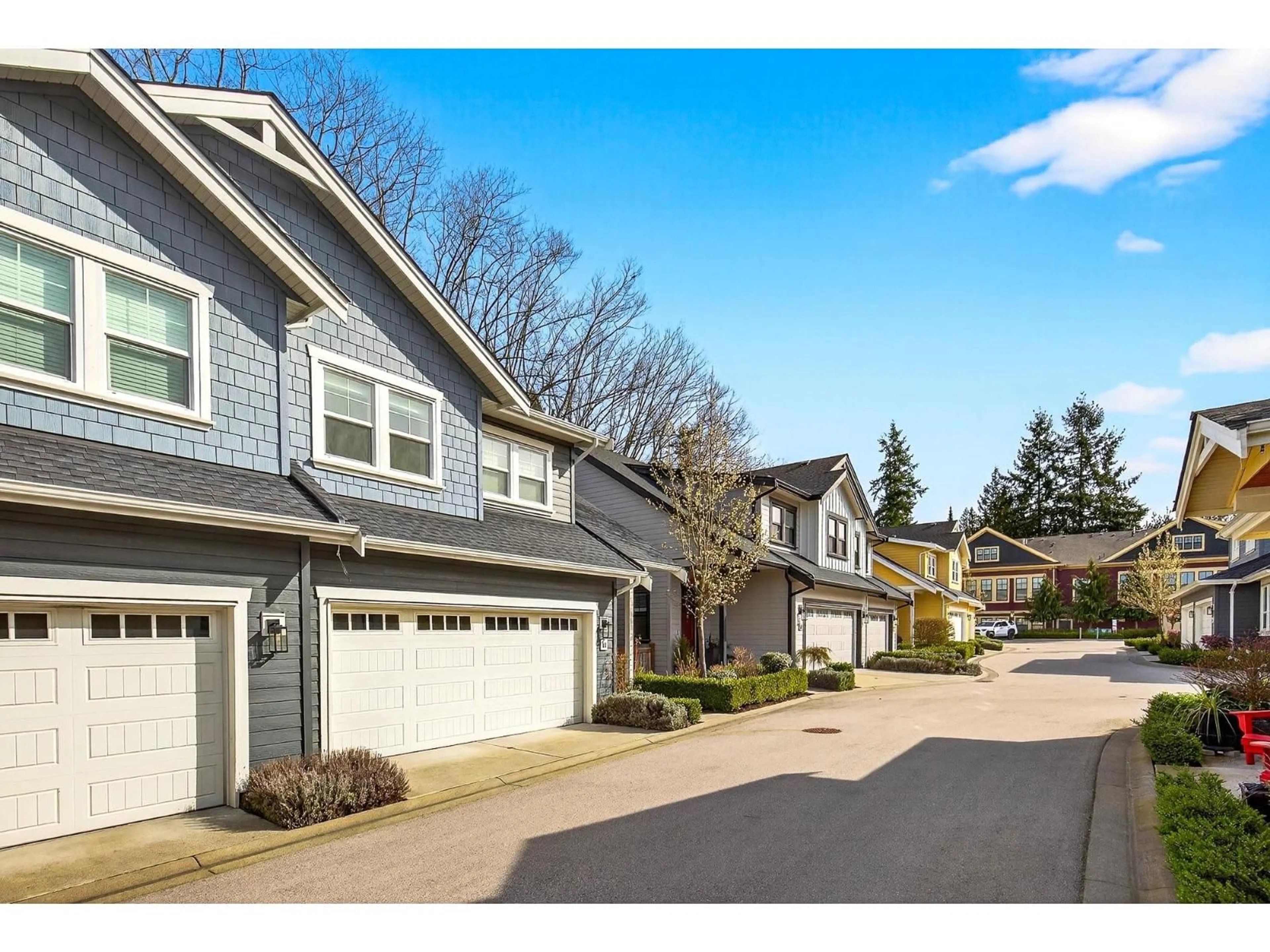 Home with vinyl exterior material, street for 11 - 21858 47B AVENUE, Langley British Columbia V3A0L3