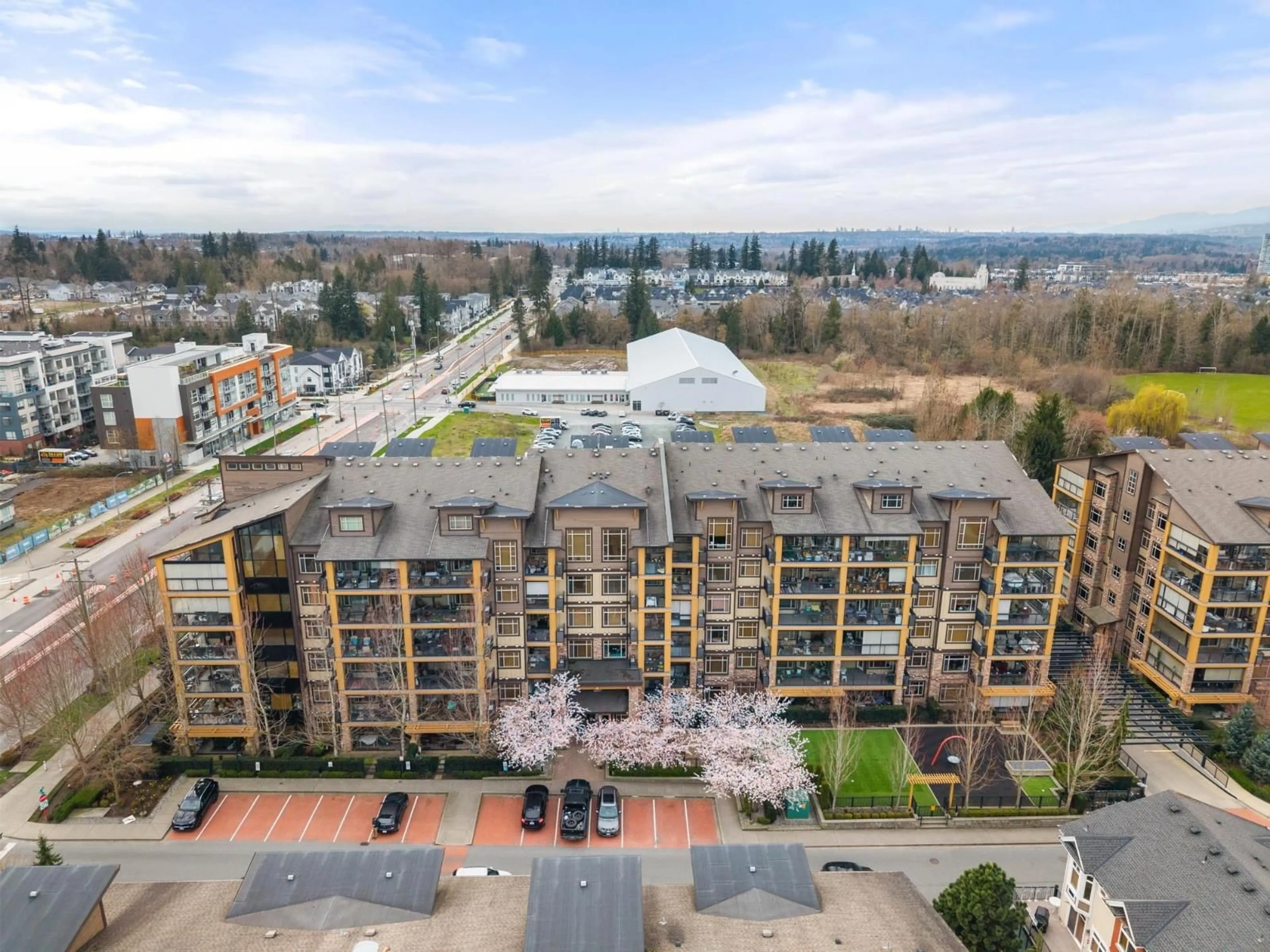 A pic from outside/outdoor area/front of a property/back of a property/a pic from drone, city buildings view from balcony for B115 - 8067 207 STREET, Langley British Columbia V2Y0N9