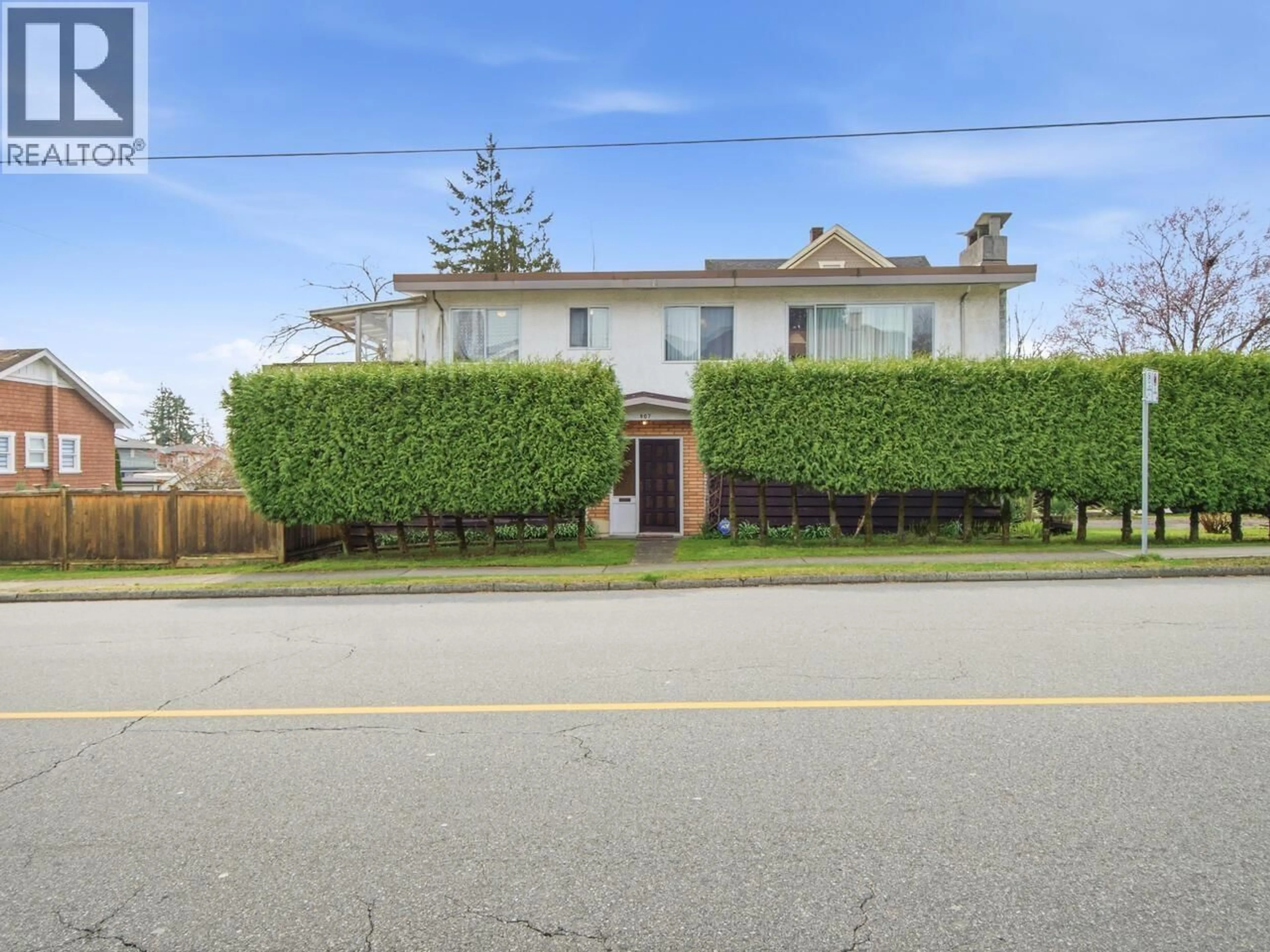 A pic from outside/outdoor area/front of a property/back of a property/a pic from drone, street for 407 13TH STREET, North Vancouver British Columbia V7L2M2