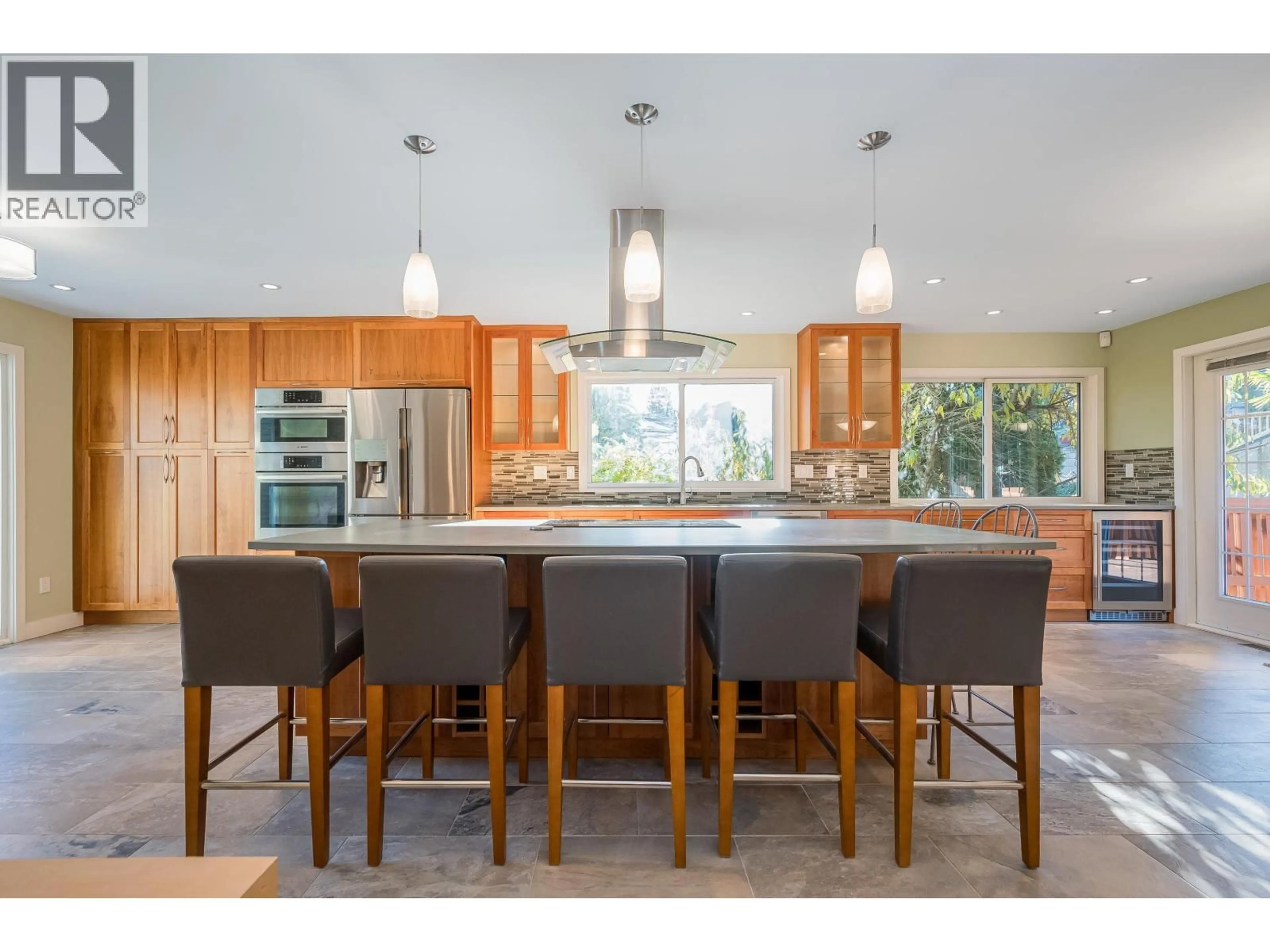 Open concept kitchen, wood/laminate floor for 73 WOODLAND DRIVE, Delta British Columbia V4L2H7
