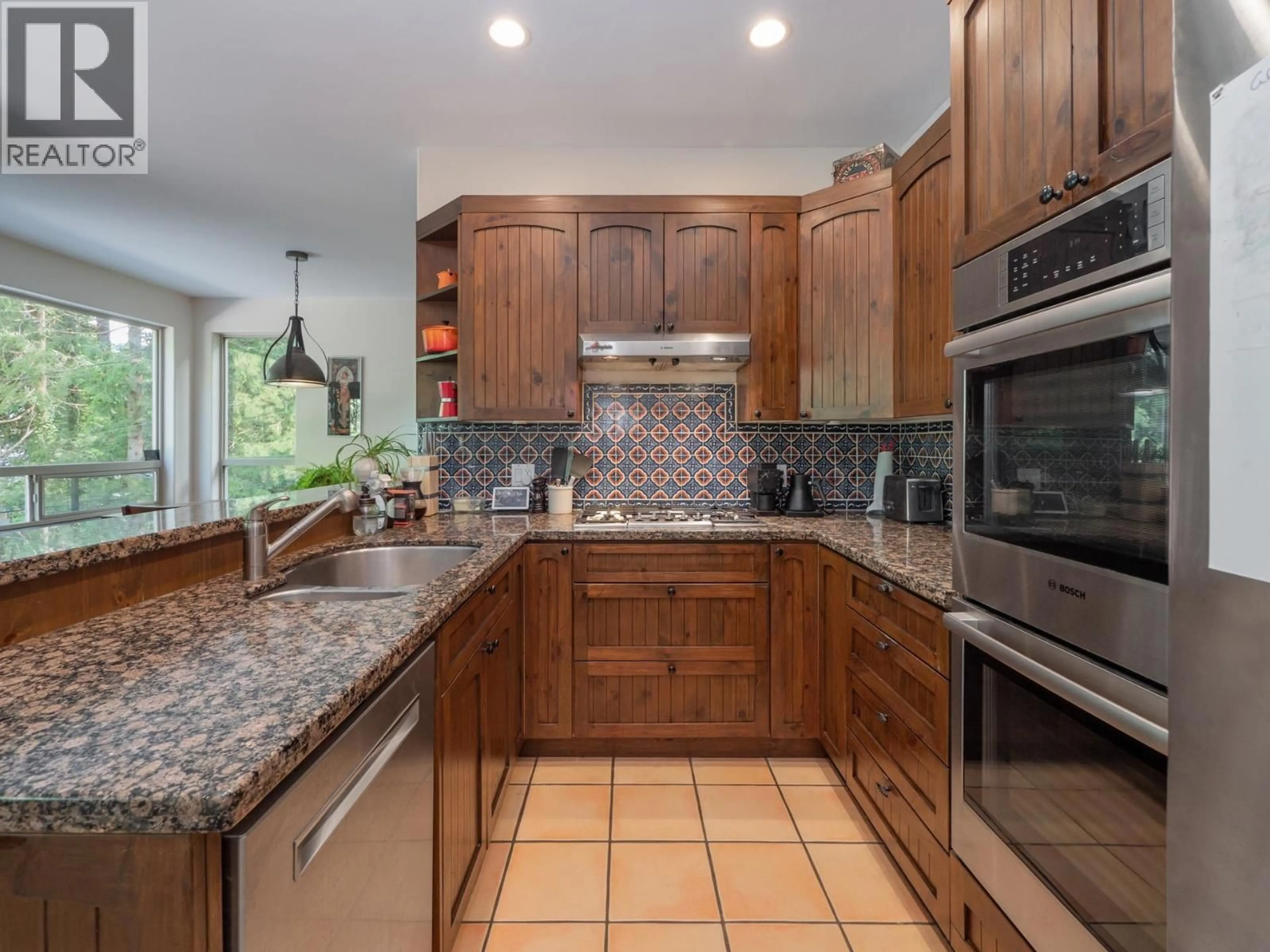 Open concept kitchen, ceramic/tile floor for 5836 MARINE WAY, Sechelt British Columbia V7Z0R3