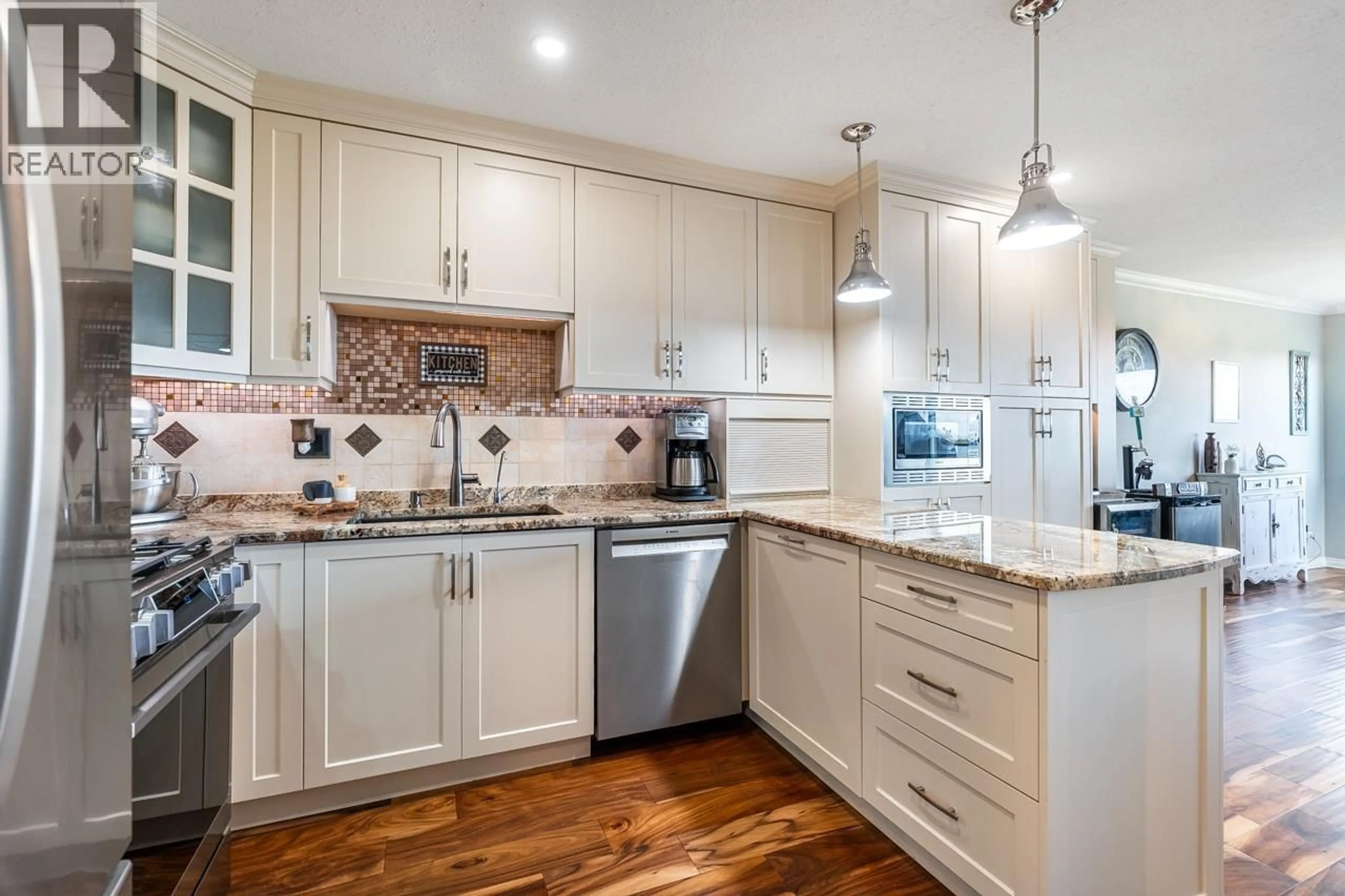 Open concept kitchen, unknown for 114 - 2721 ATLIN PLACE, Coquitlam British Columbia V3C5B1