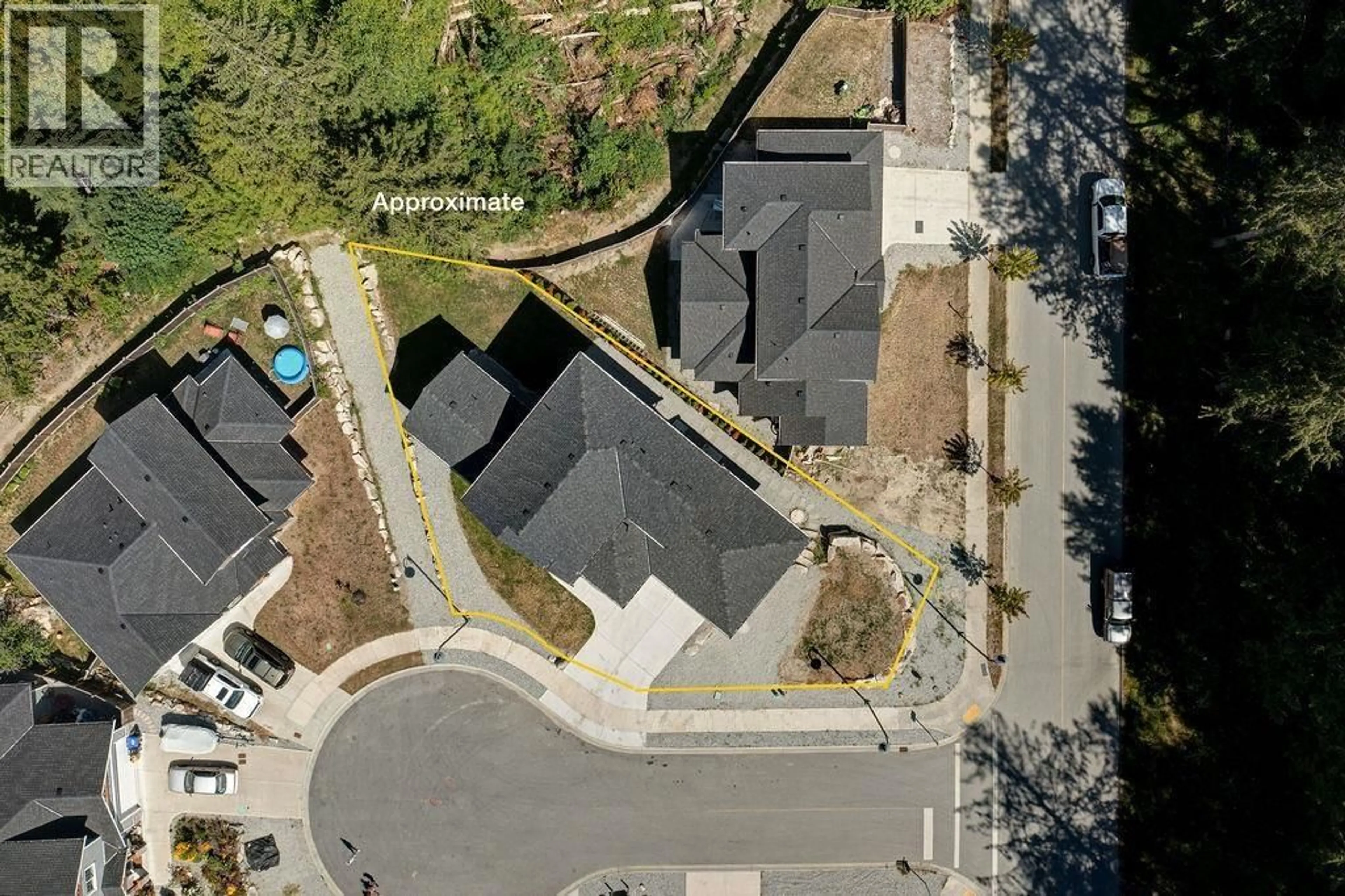 A pic from outside/outdoor area/front of a property/back of a property/a pic from drone, street for 6070-72 HEARTWOOD PLACE, Sechelt British Columbia V7Z0V6