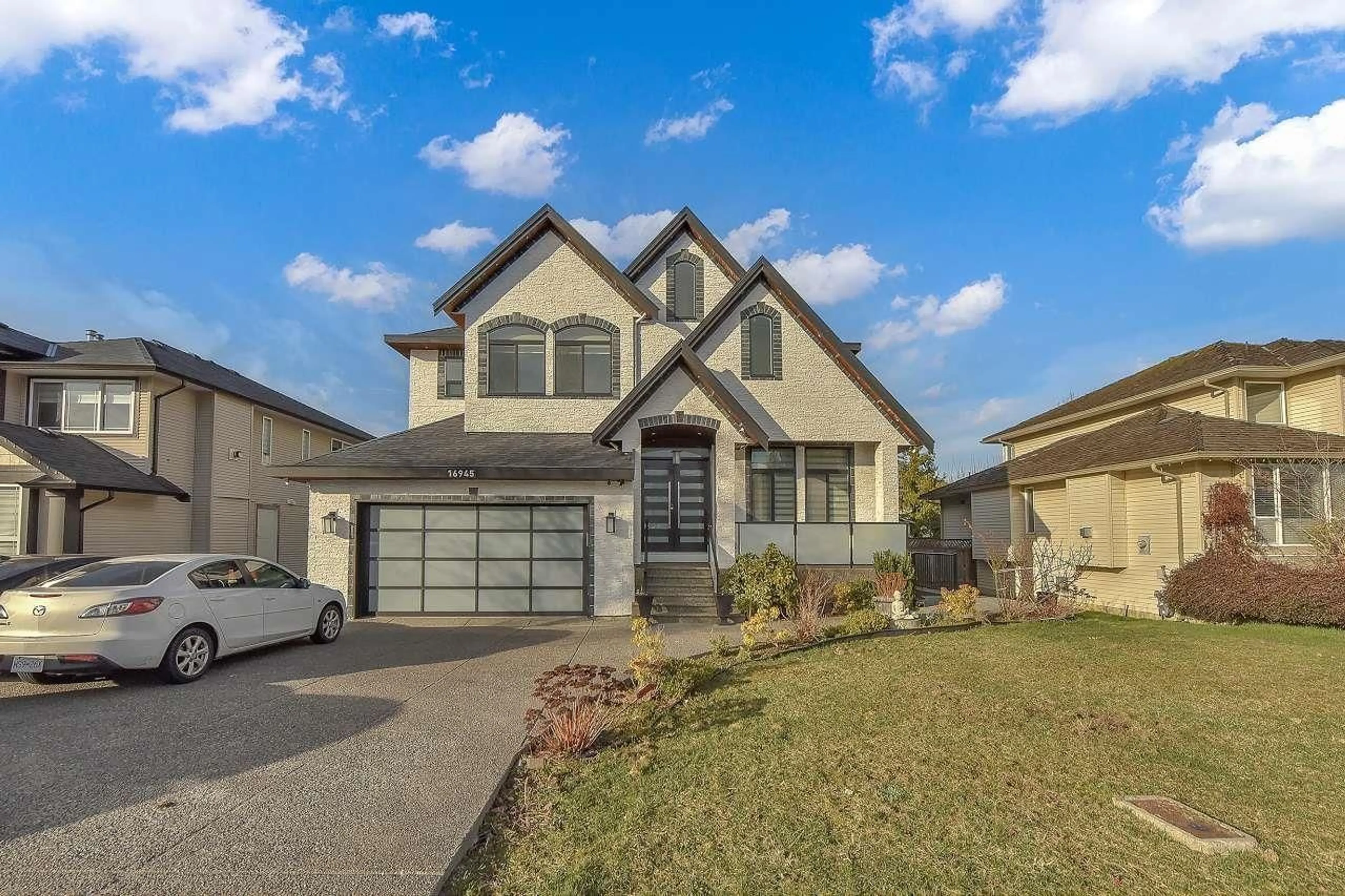 Home with vinyl exterior material, street for 16945 60 AVENUE, Surrey British Columbia V3S1T1