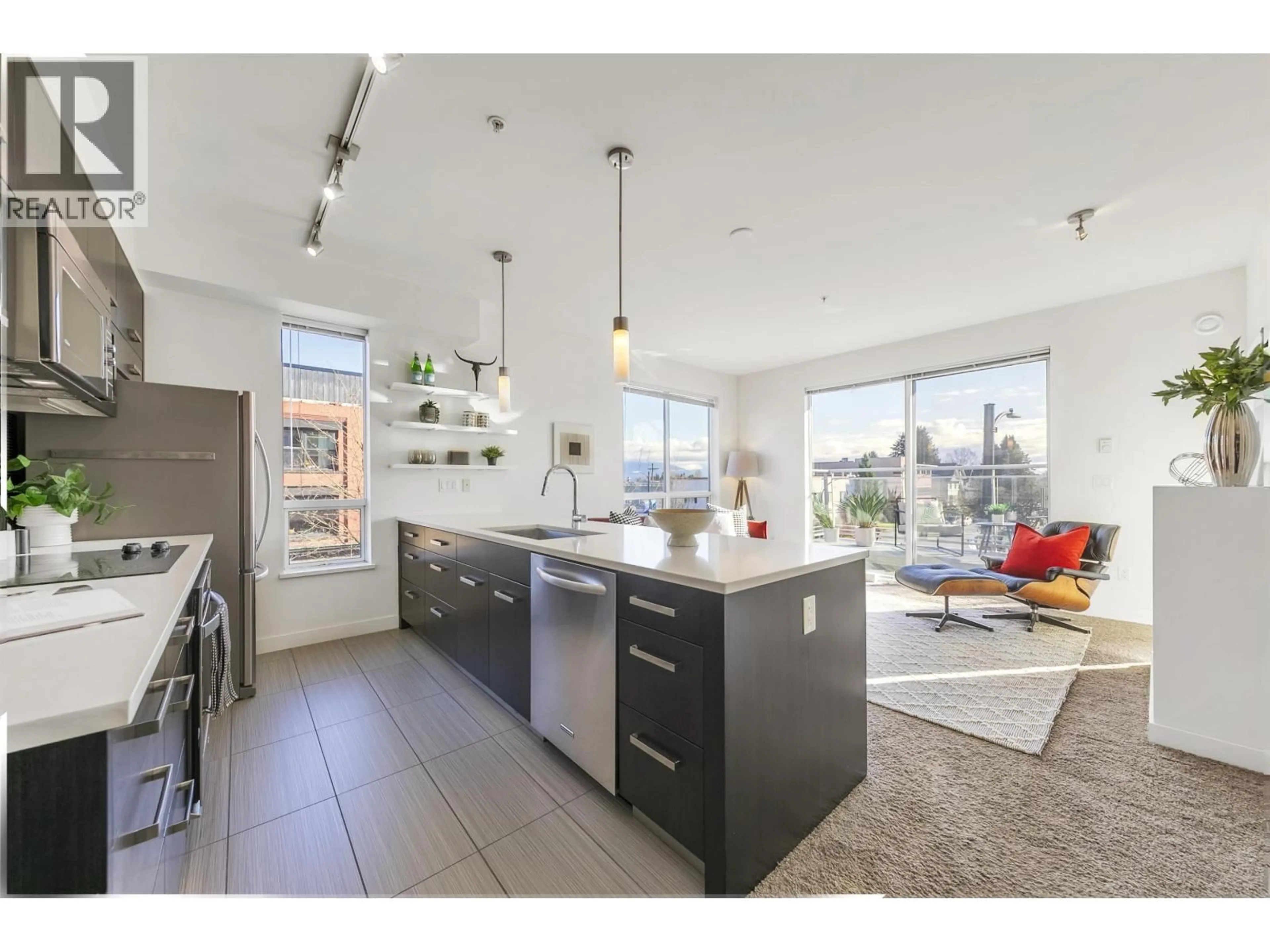 Open concept kitchen, unknown for 206 - 3333 MAIN STREET, Vancouver British Columbia V5V3M8