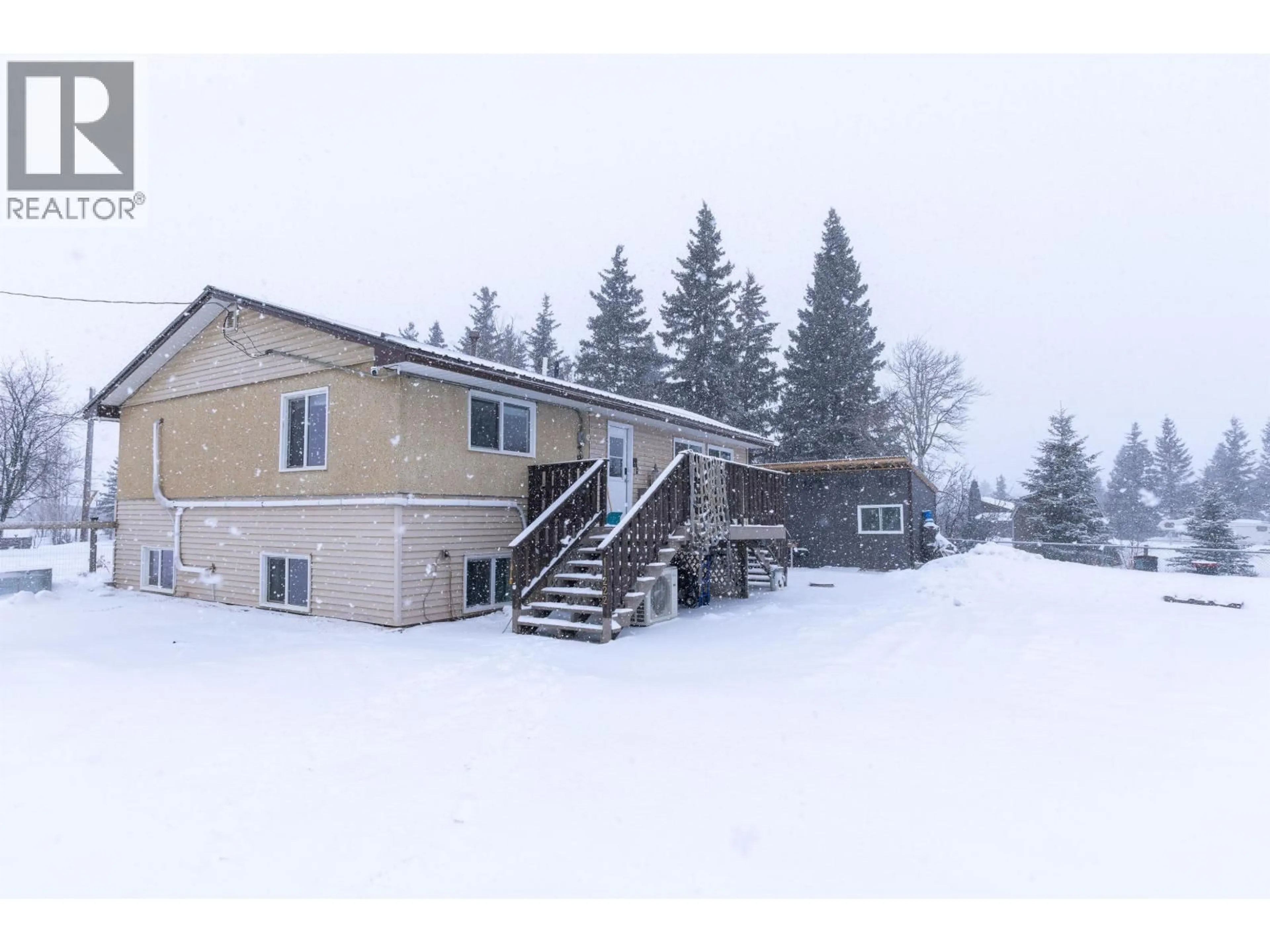 A pic from outside/outdoor area/front of a property/back of a property/a pic from drone, unknown for 11222 POPLAR ROAD, Fort St. John British Columbia V1J4M7