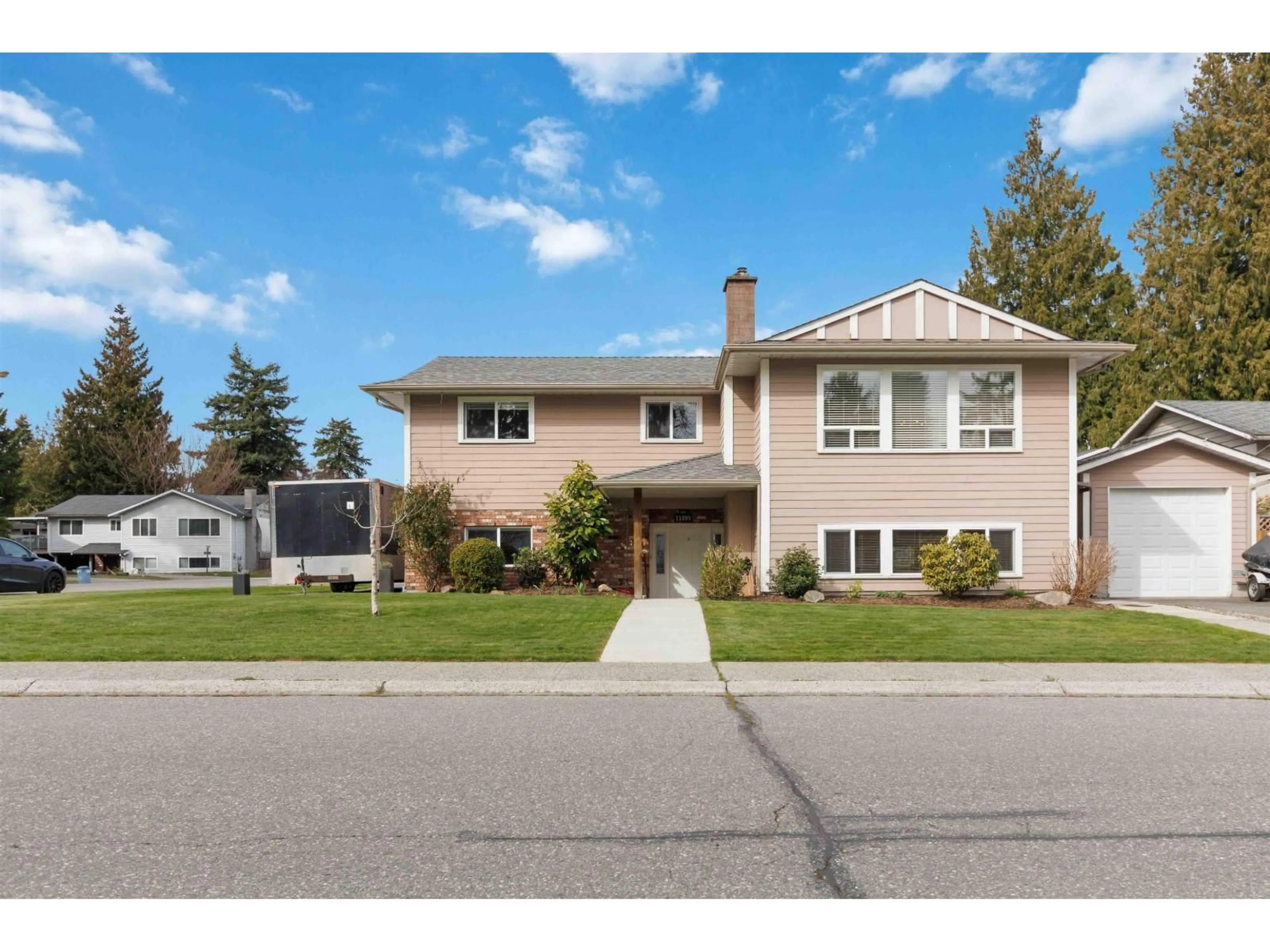 Home with vinyl exterior material, street for 11895 82A AVENUE, Delta British Columbia V4C3P6