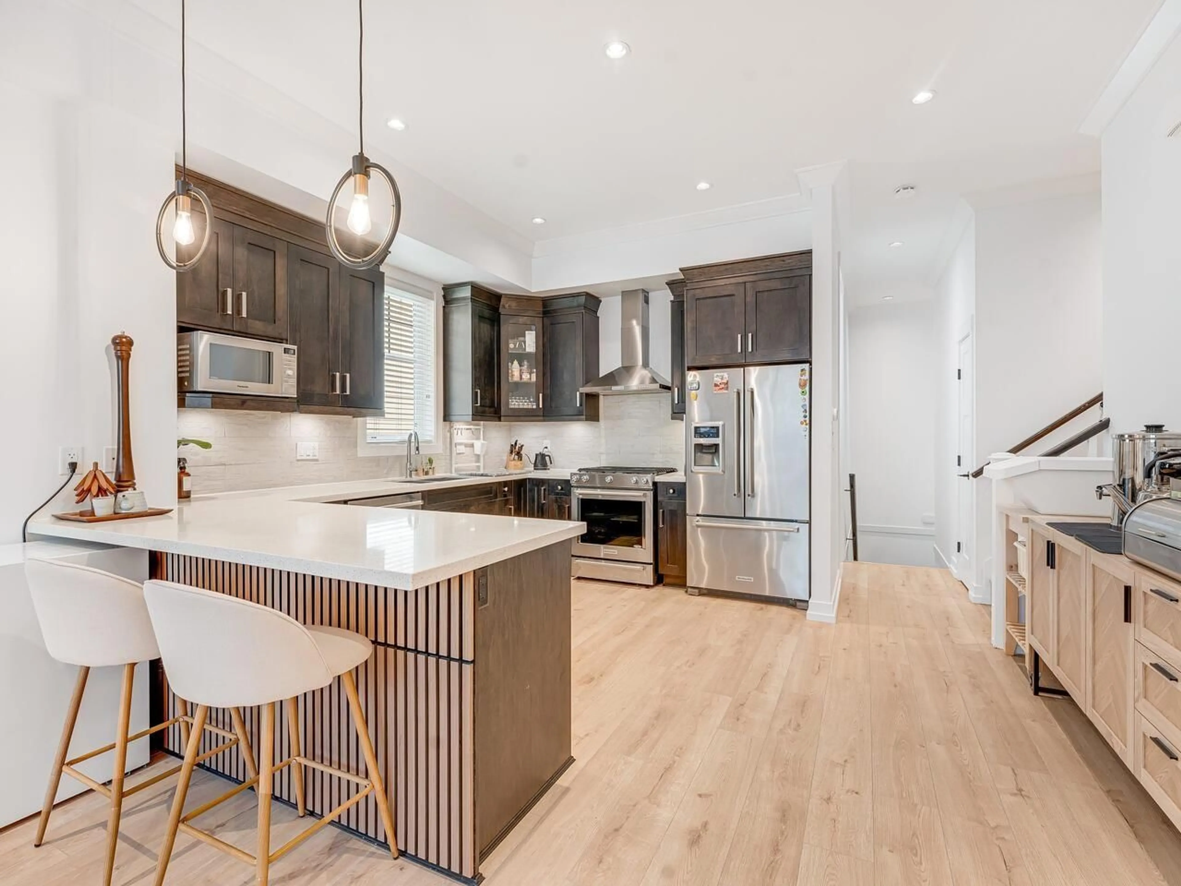 Open concept kitchen, wood/laminate floor for 2238 164A STREET, Surrey British Columbia V3Z0L8