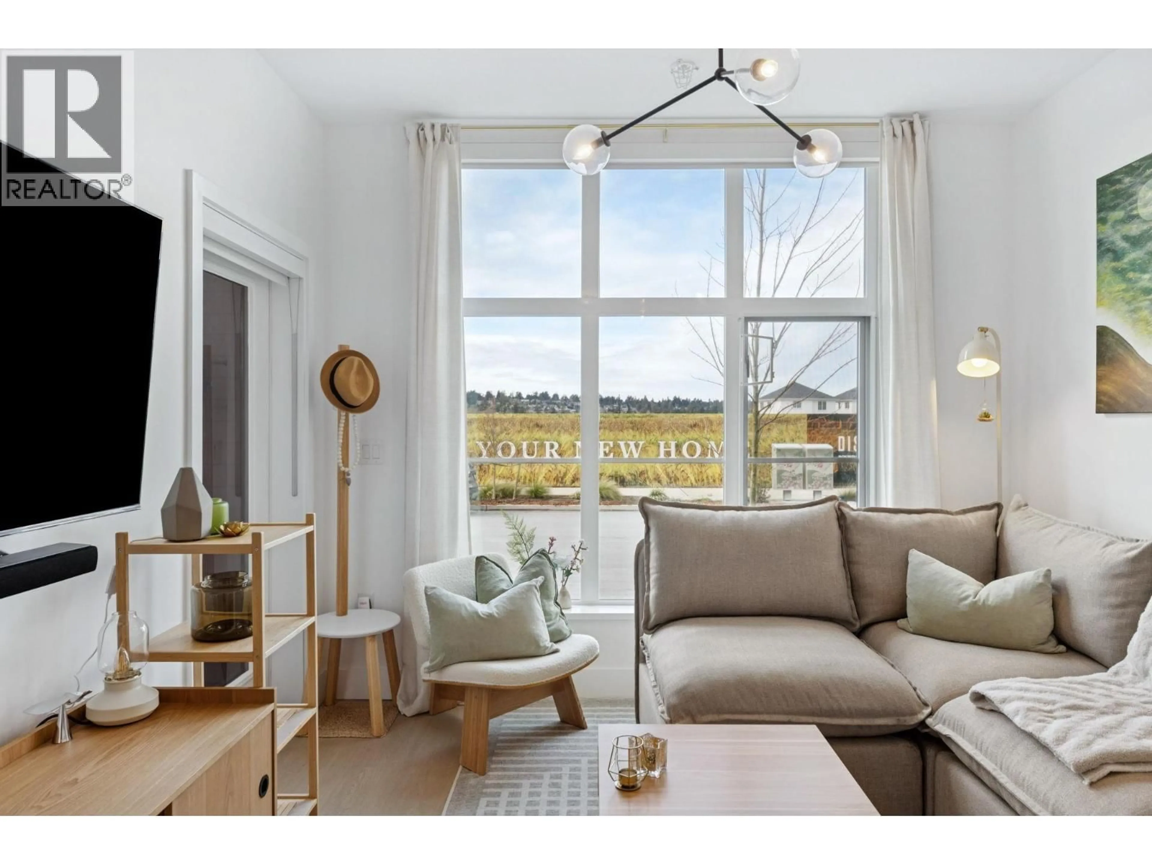 Living room with furniture, wood/laminate floor for 101 - 320 RIDGE STREET, Tsawwassen British Columbia V4L0B5