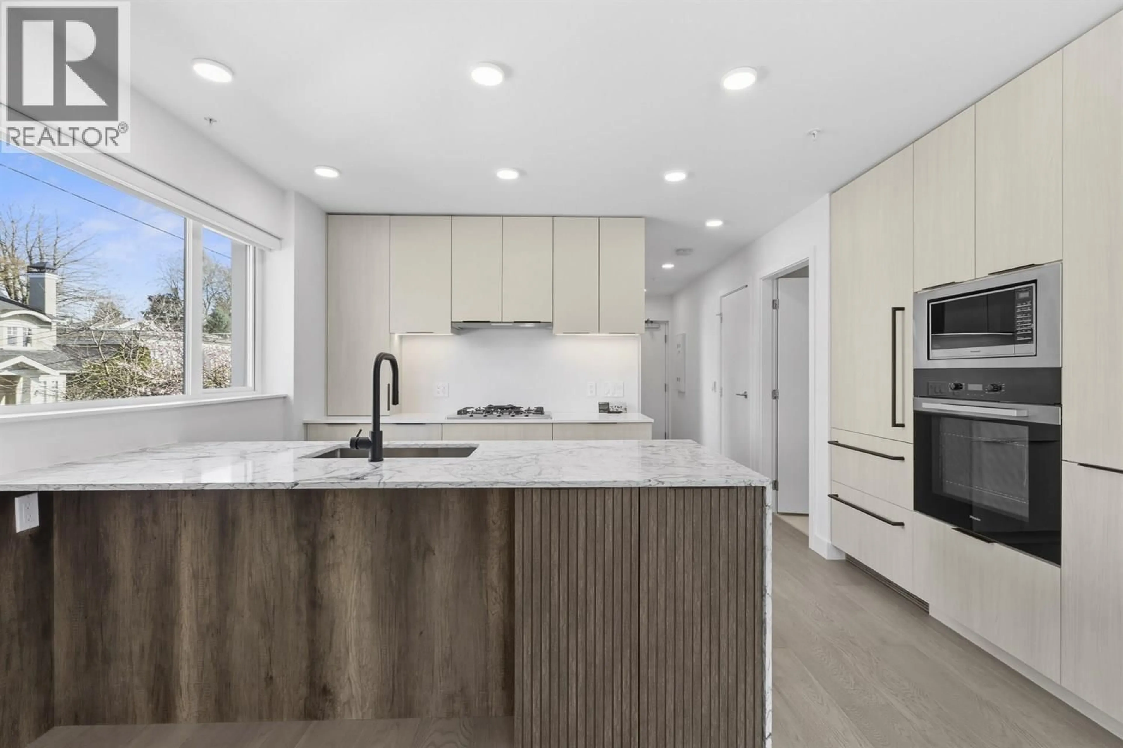 Open concept kitchen, unknown for 201 - 3590 39TH AVENUE, Vancouver British Columbia V6N3A5