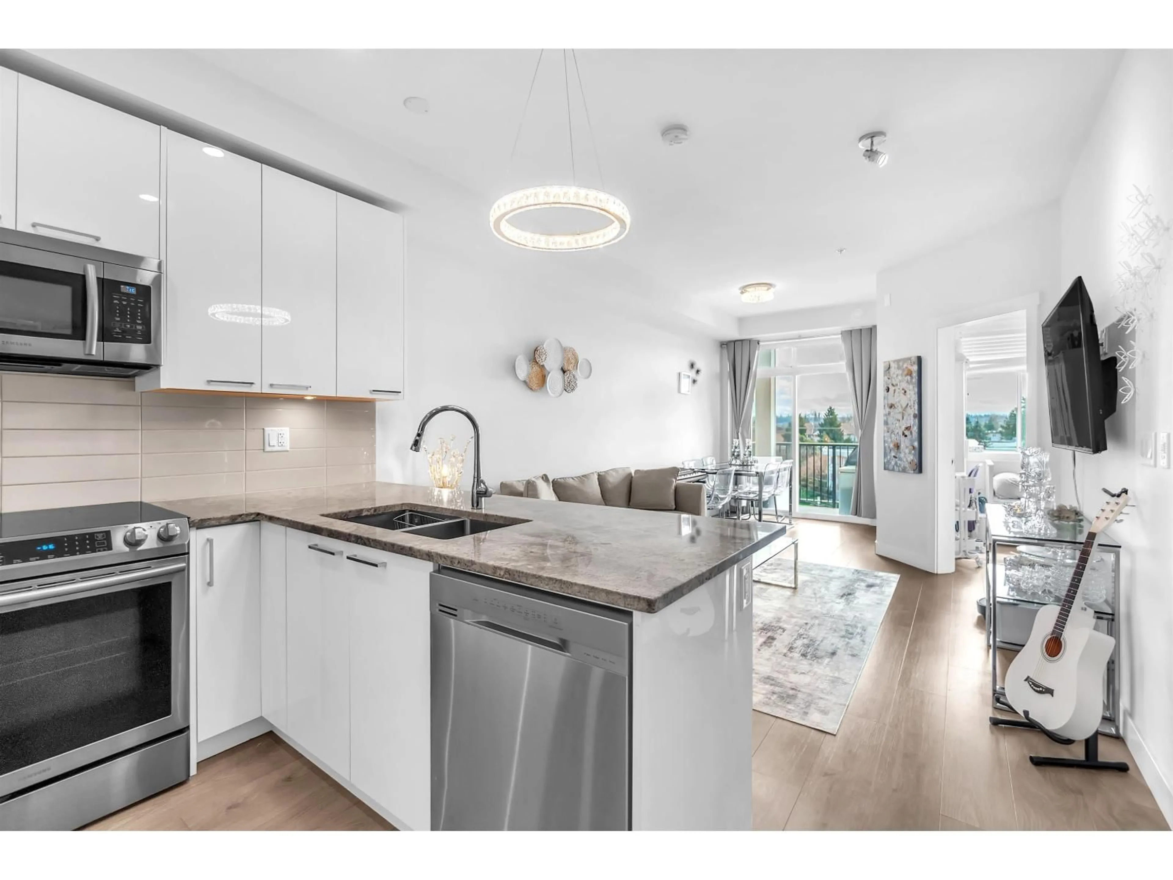 Open concept kitchen, unknown for 410 - 20696 EASTLEIGH CRESCENT, Langley British Columbia V3A0M3