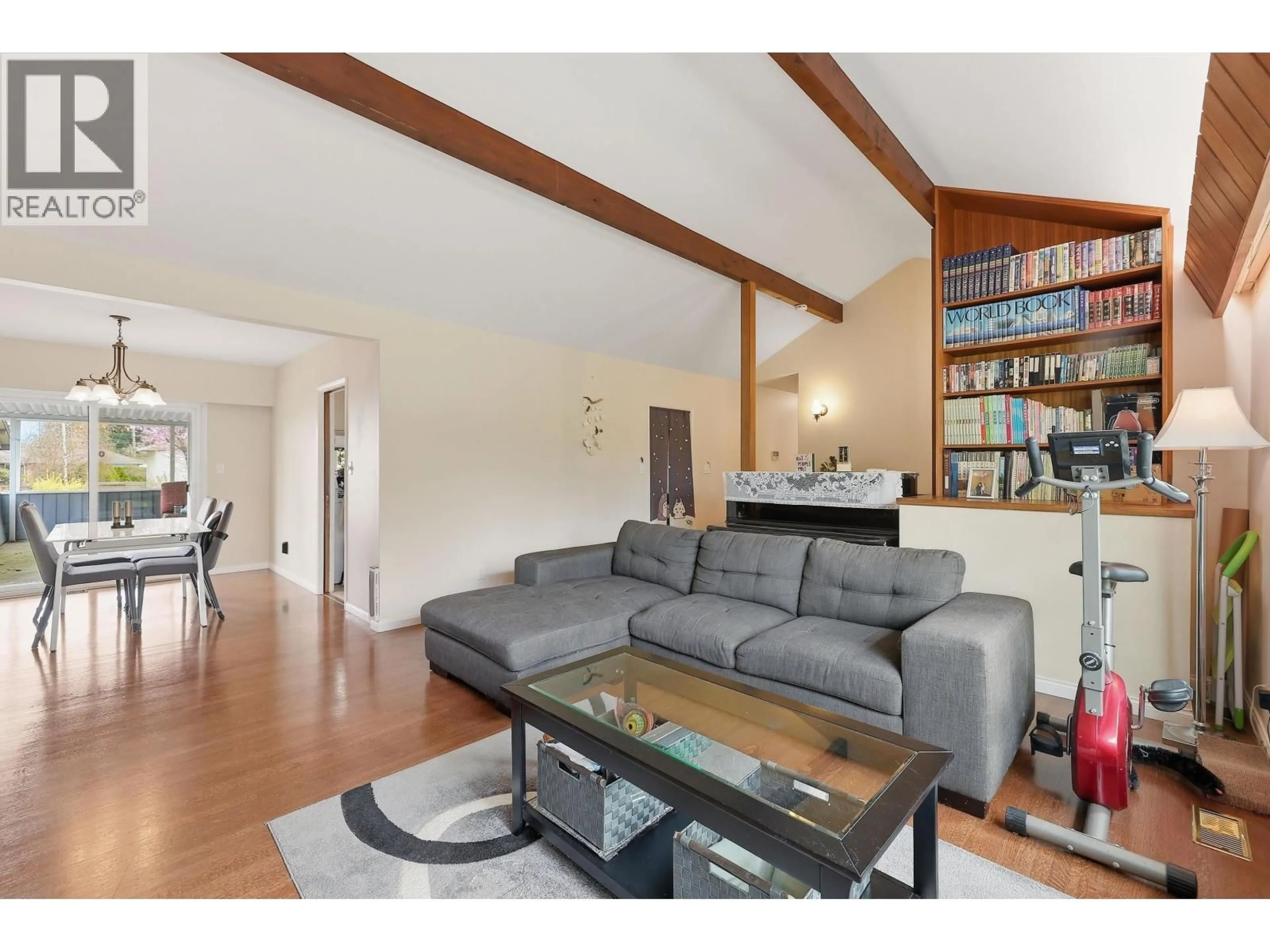 Living room with furniture, wood/laminate floor for 11936 WICKLOW WAY, Maple Ridge British Columbia V2X3A9