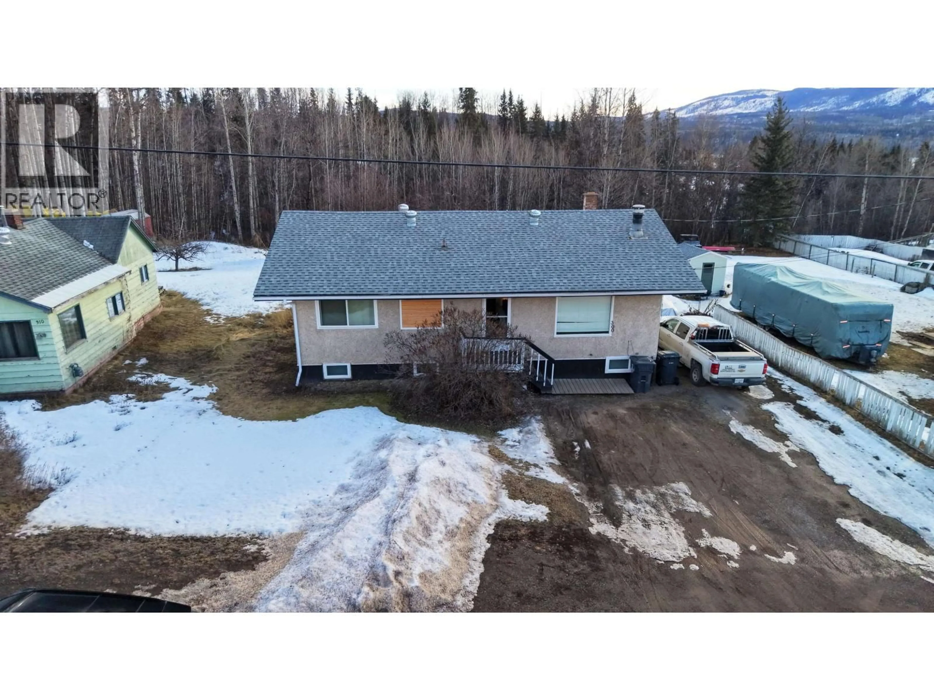 A pic from outside/outdoor area/front of a property/back of a property/a pic from drone, mountain view for 300 8TH AVENUE, Burns Lake British Columbia V0J1E0
